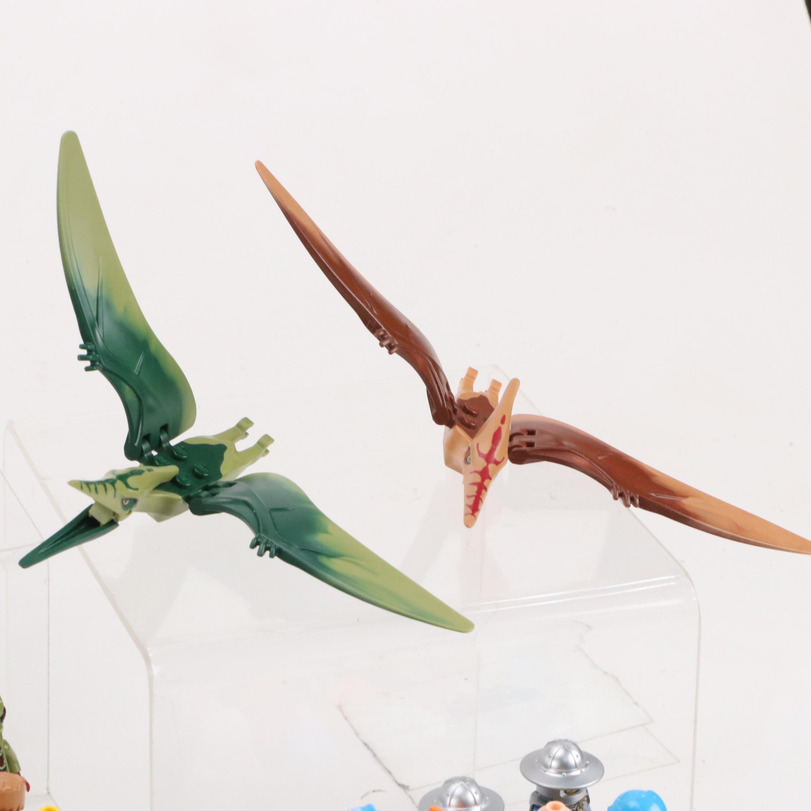 LEGO Mini Figures with Assorted Bricks and Instruction Booklets