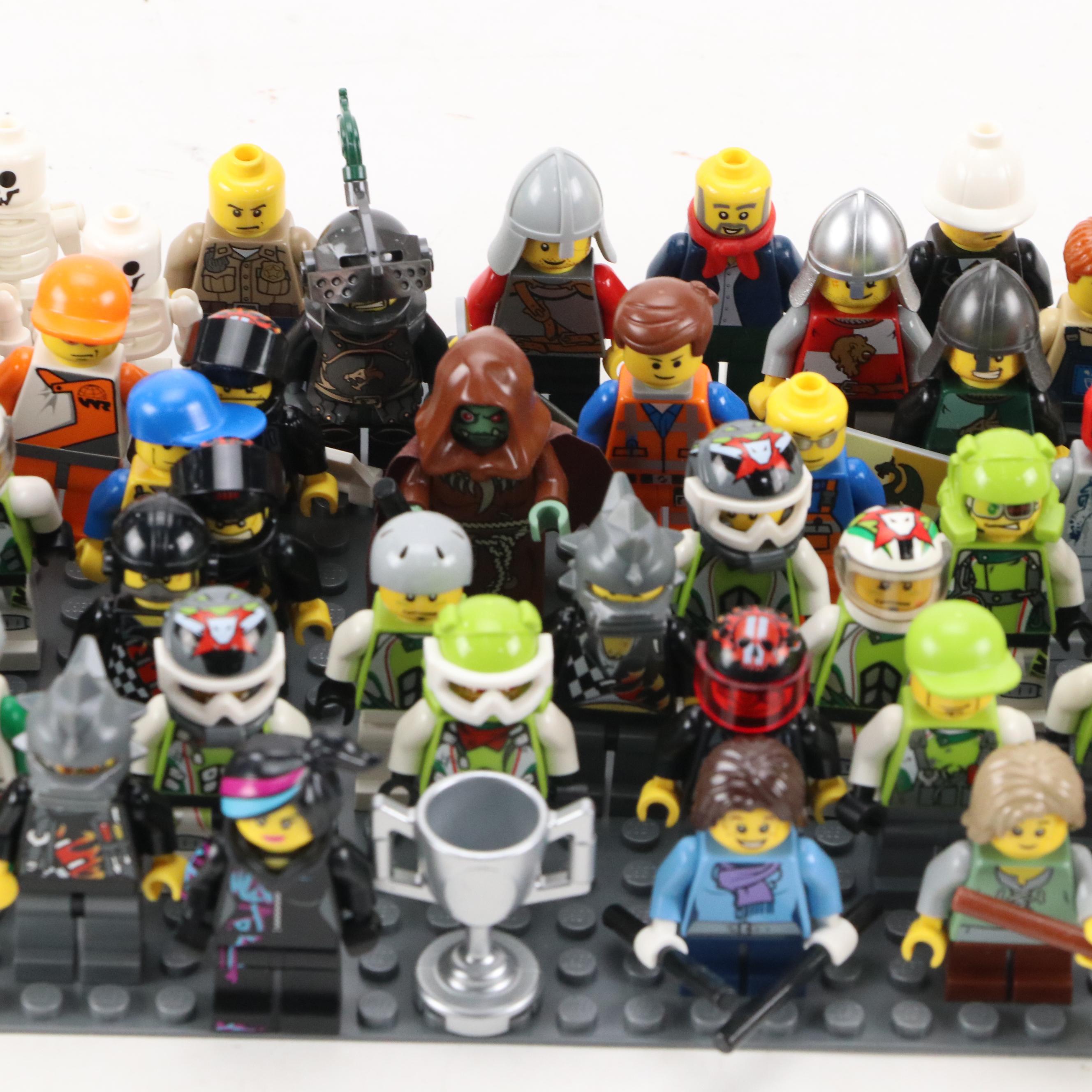 LEGO Mini Figures with Assorted Bricks and Instruction Booklets