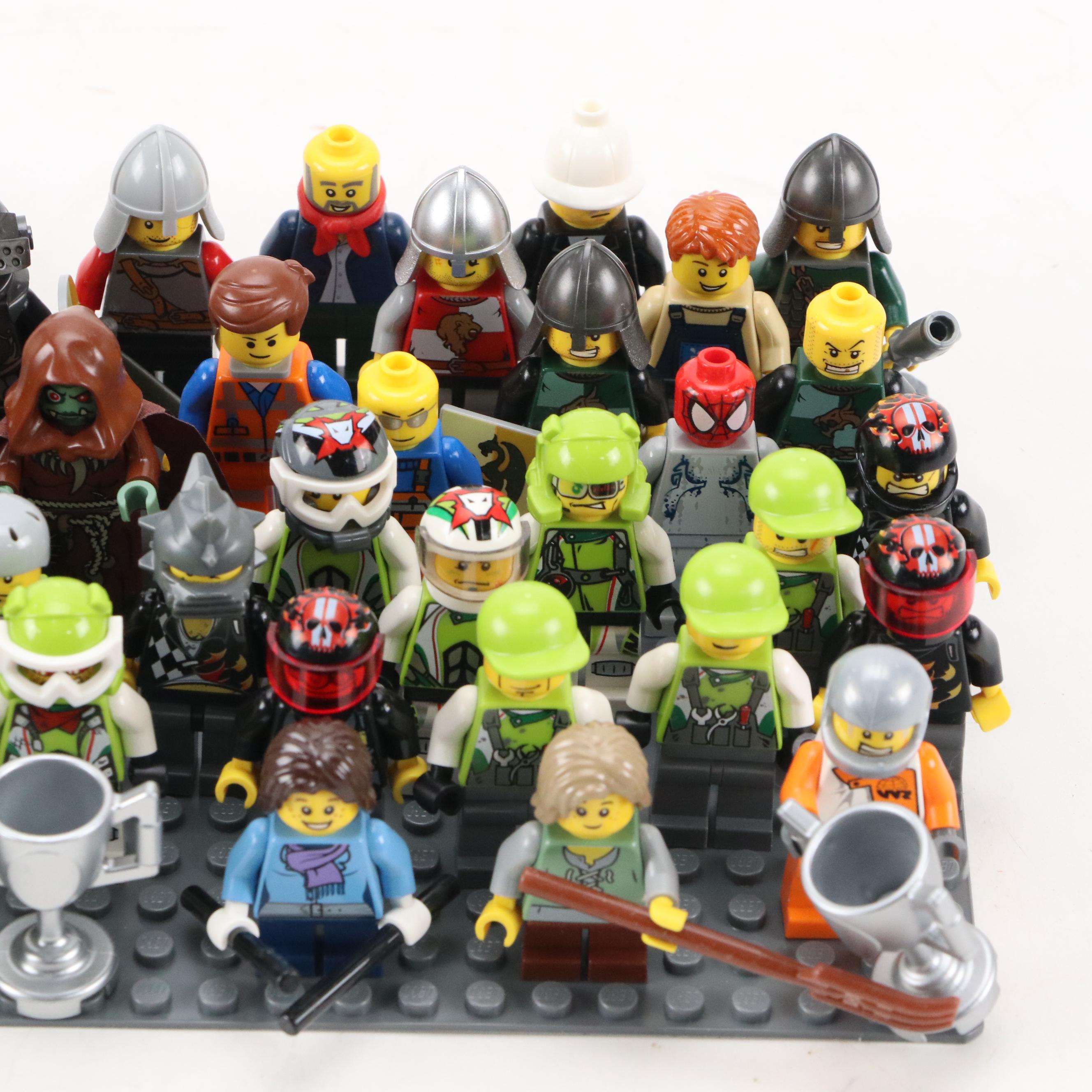 LEGO Mini Figures with Assorted Bricks and Instruction Booklets