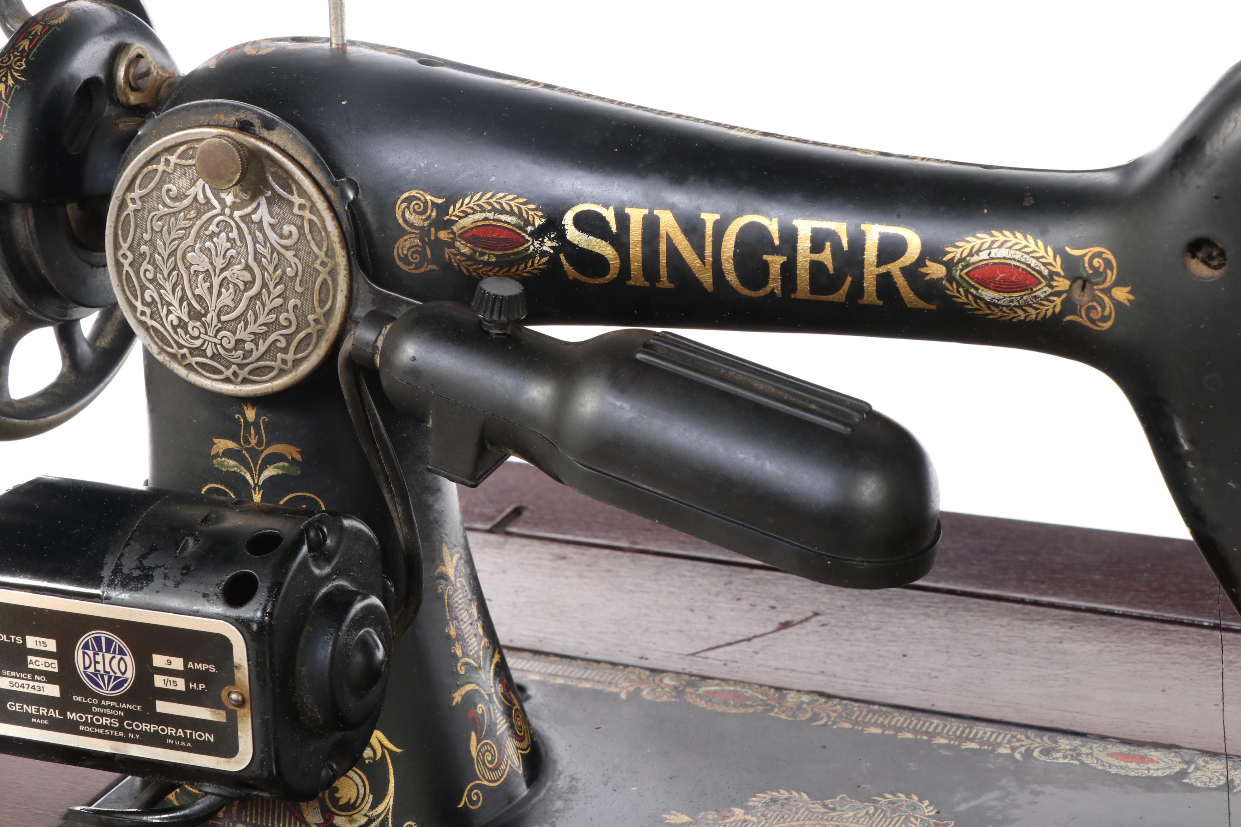 Singer Model 66 Sewing Machine in Wood Cabinet, Early 20th Century