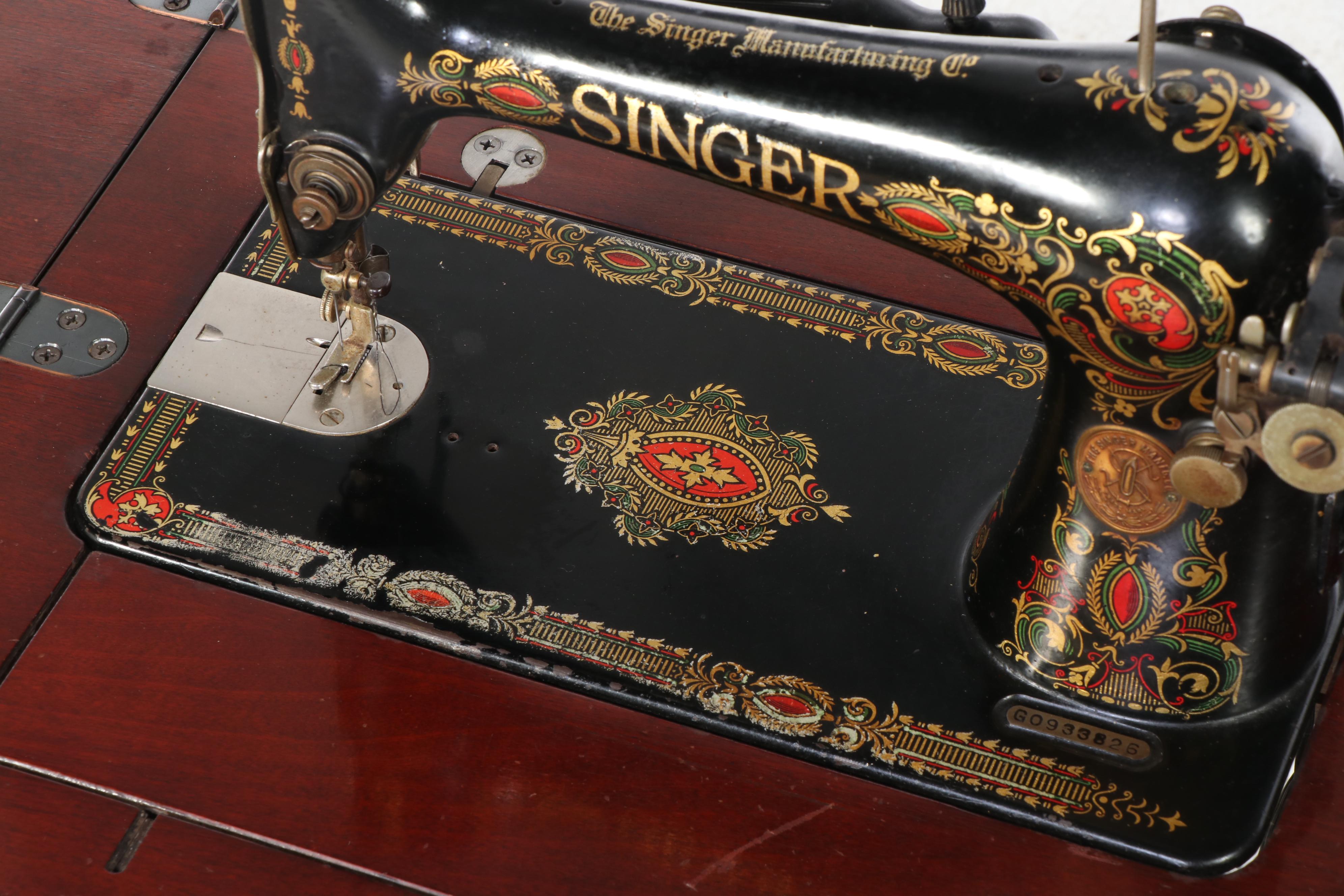 Singer Model 66 Sewing Machine in Wood Cabinet, Early 20th Century