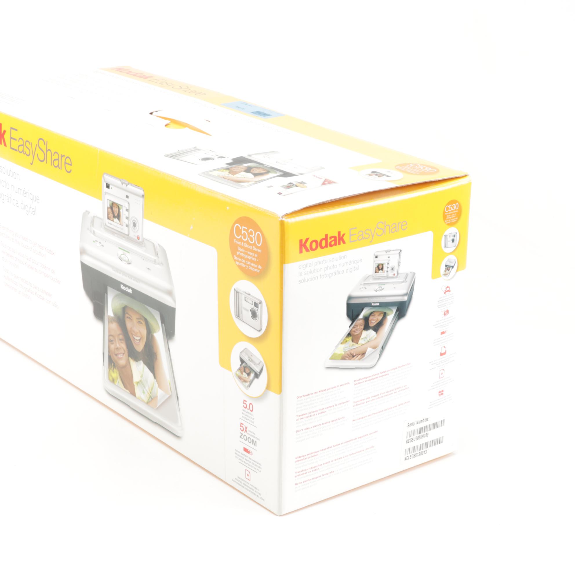 Three Kodak Easy Share Printer Docks with Supplies, 21st Century