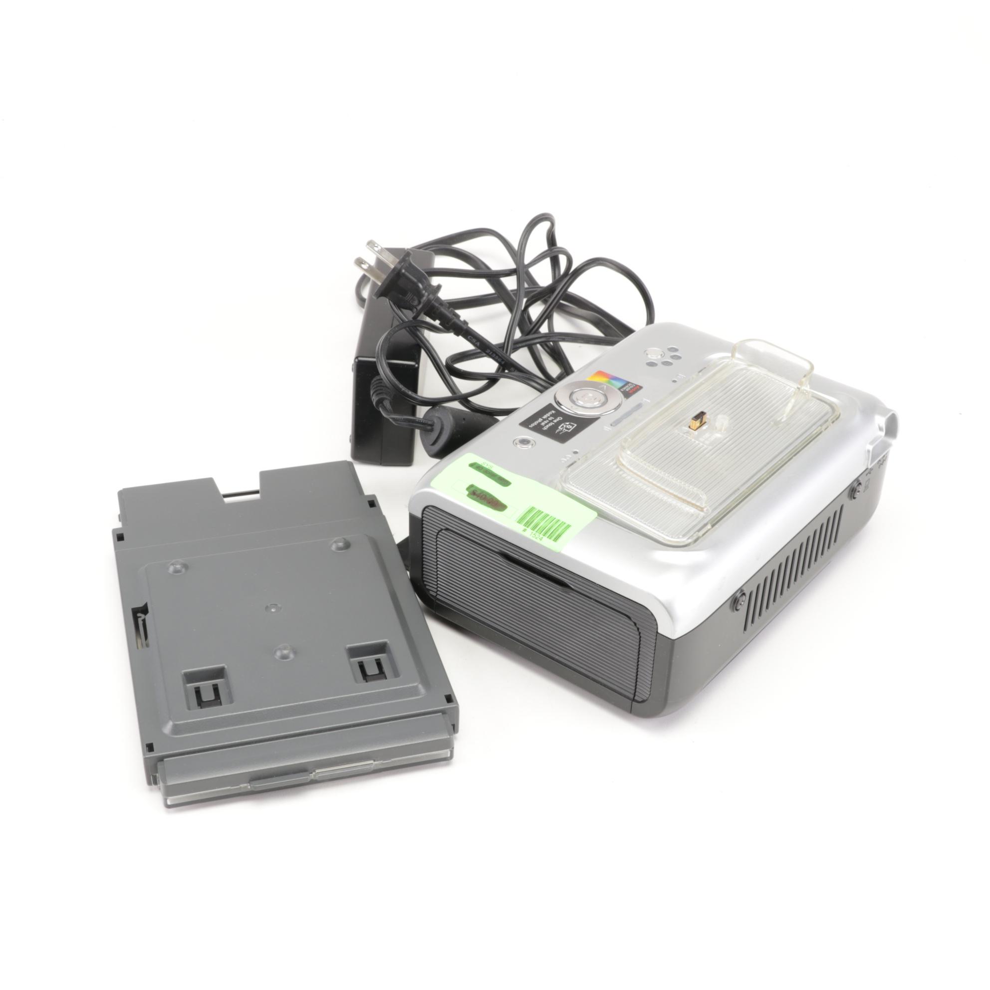 Three Kodak Easy Share Printer Docks with Supplies, 21st Century