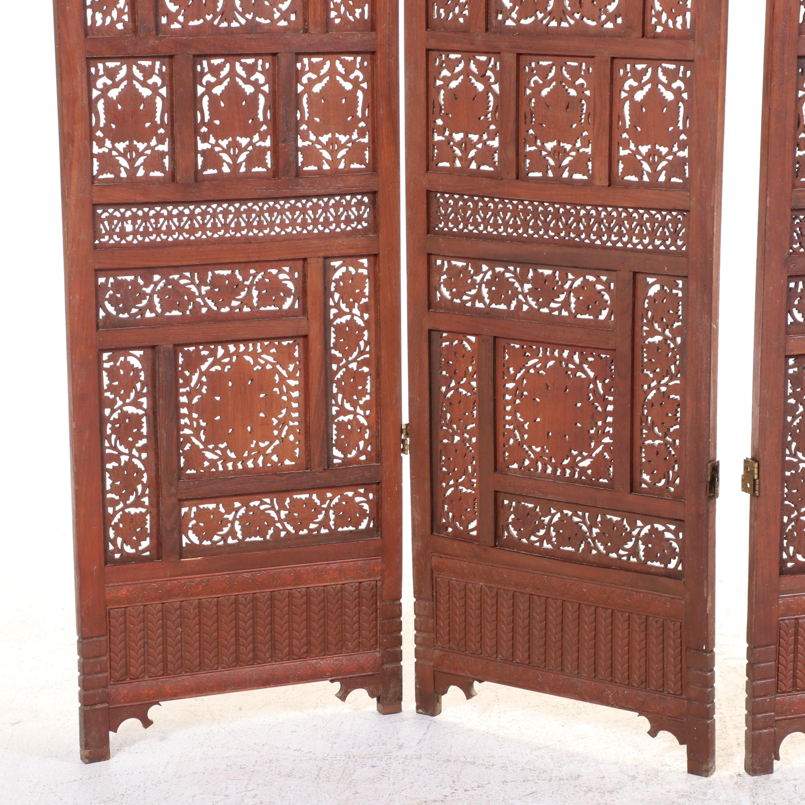 Pair of Indian Carved and Reticulated Teak Two-Panel Folding Screens