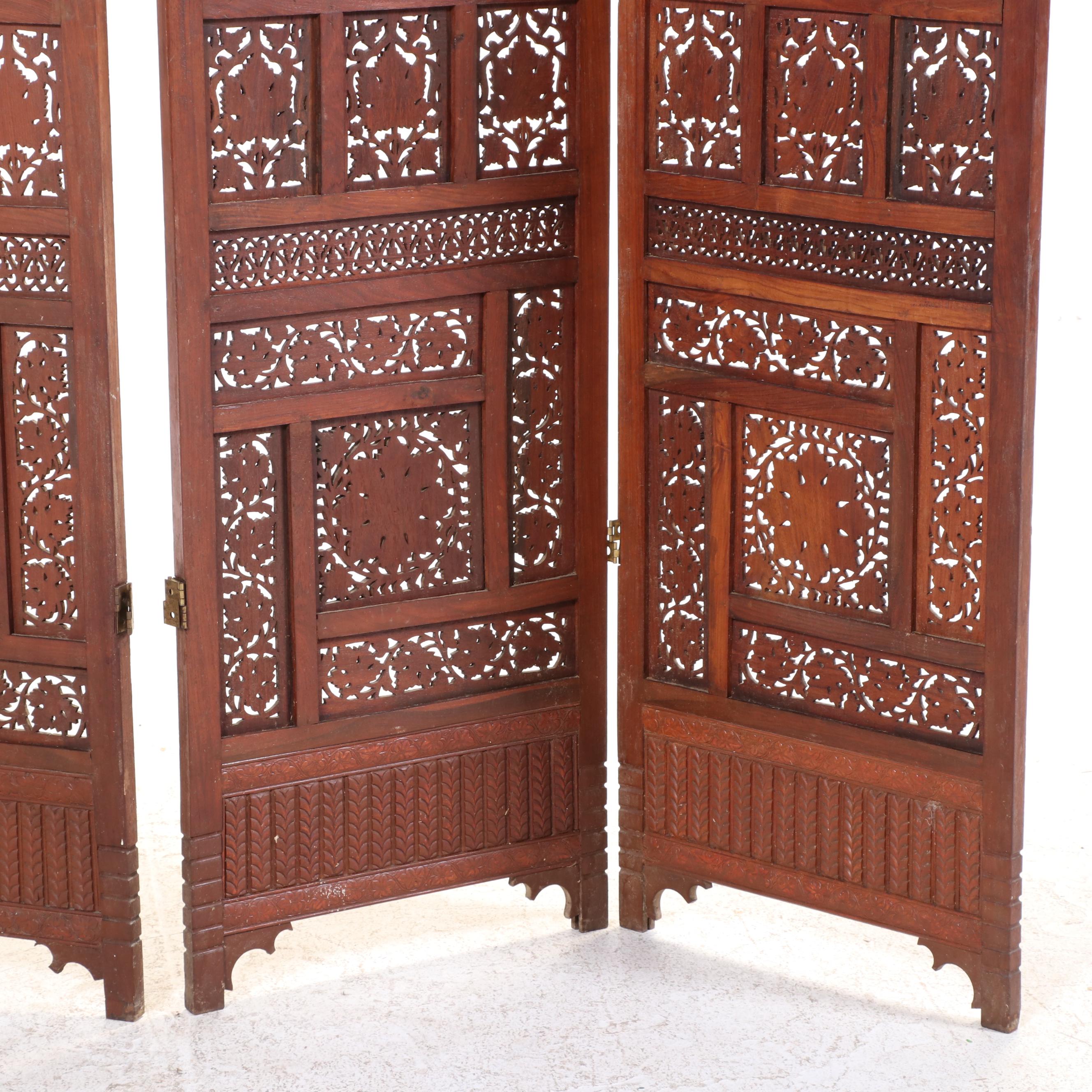 Pair of Indian Carved and Reticulated Teak Two-Panel Folding Screens
