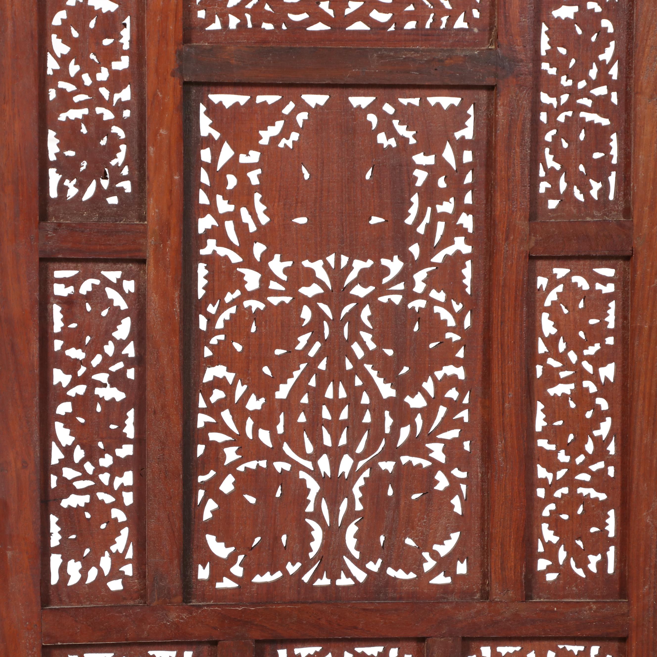 Pair of Indian Carved and Reticulated Teak Two-Panel Folding Screens