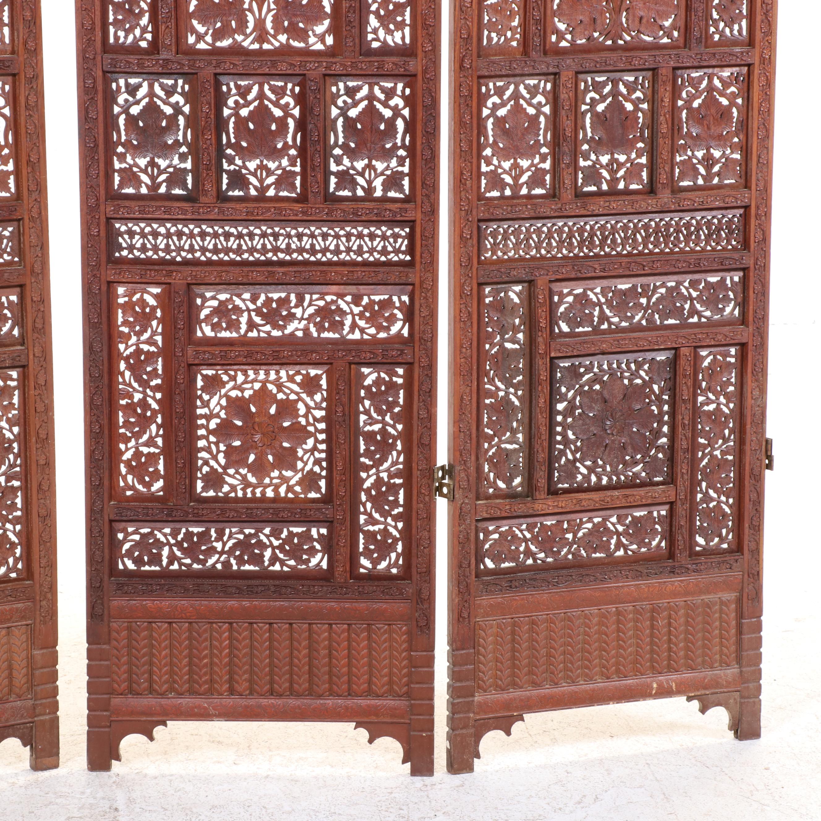 Pair of Indian Carved and Reticulated Teak Two-Panel Folding Screens