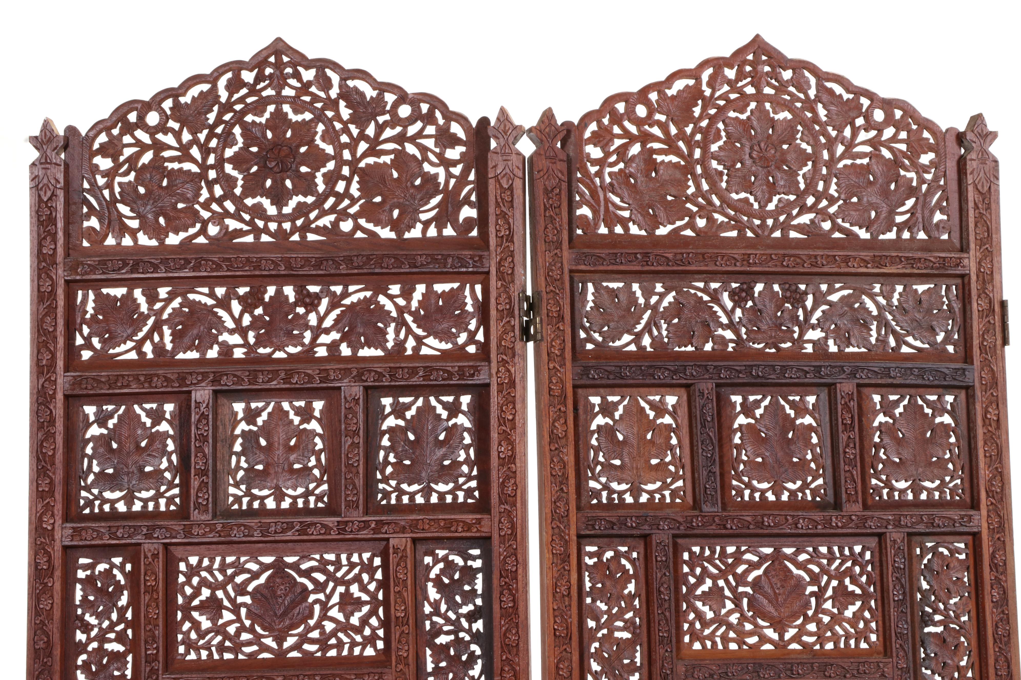 Pair of Indian Carved and Reticulated Teak Two-Panel Folding Screens