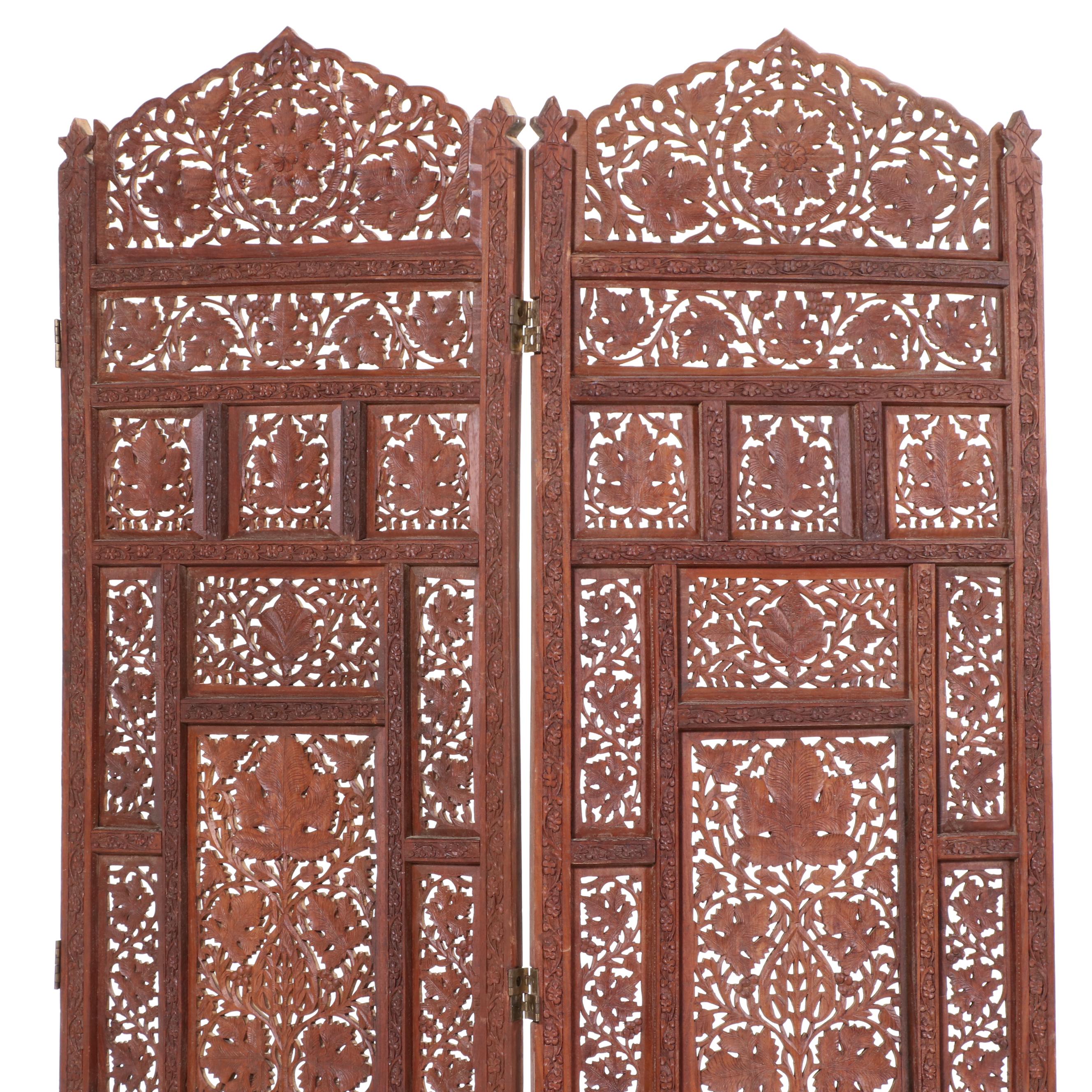 Pair of Indian Carved and Reticulated Teak Two-Panel Folding Screens