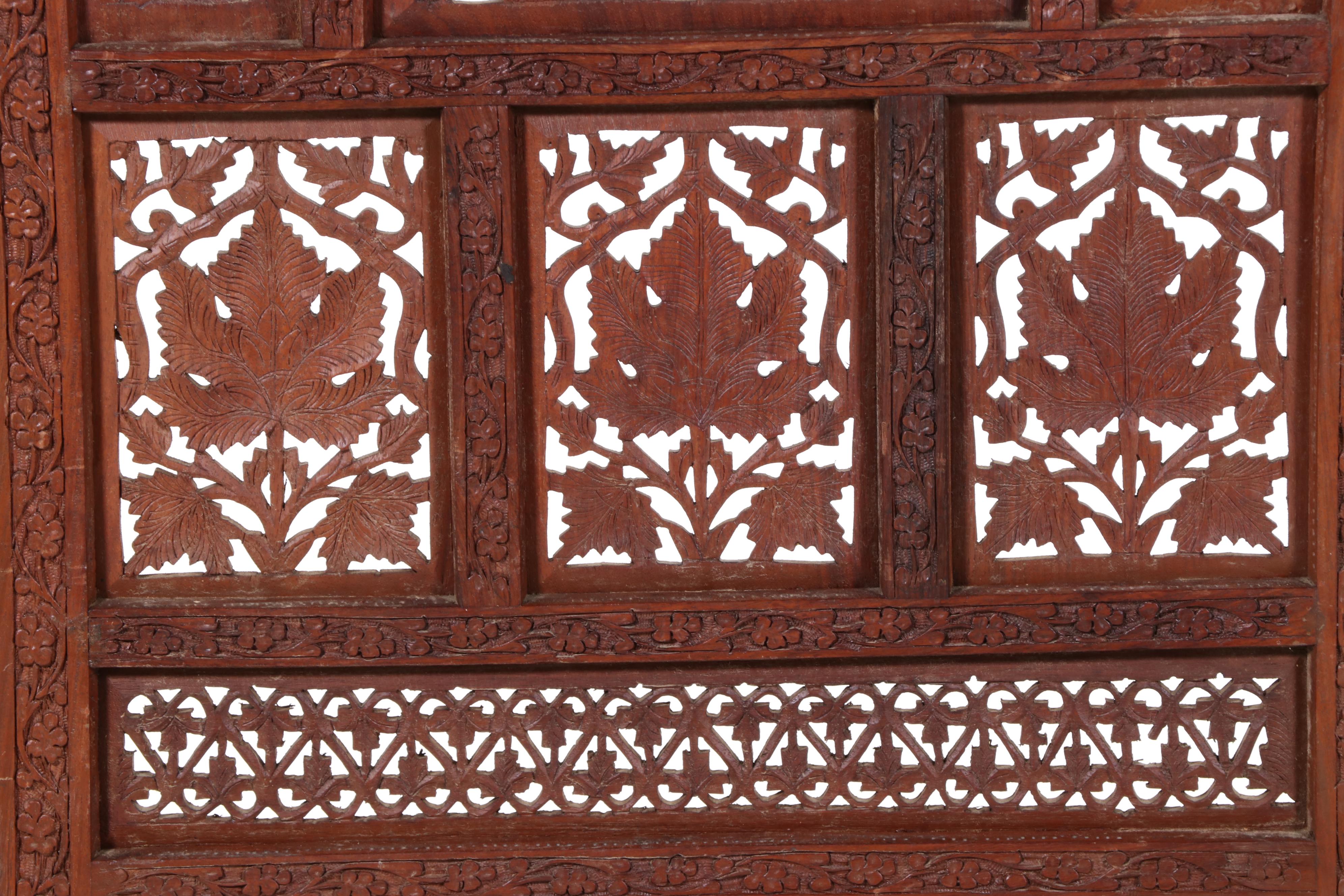 Pair of Indian Carved and Reticulated Teak Two-Panel Folding Screens