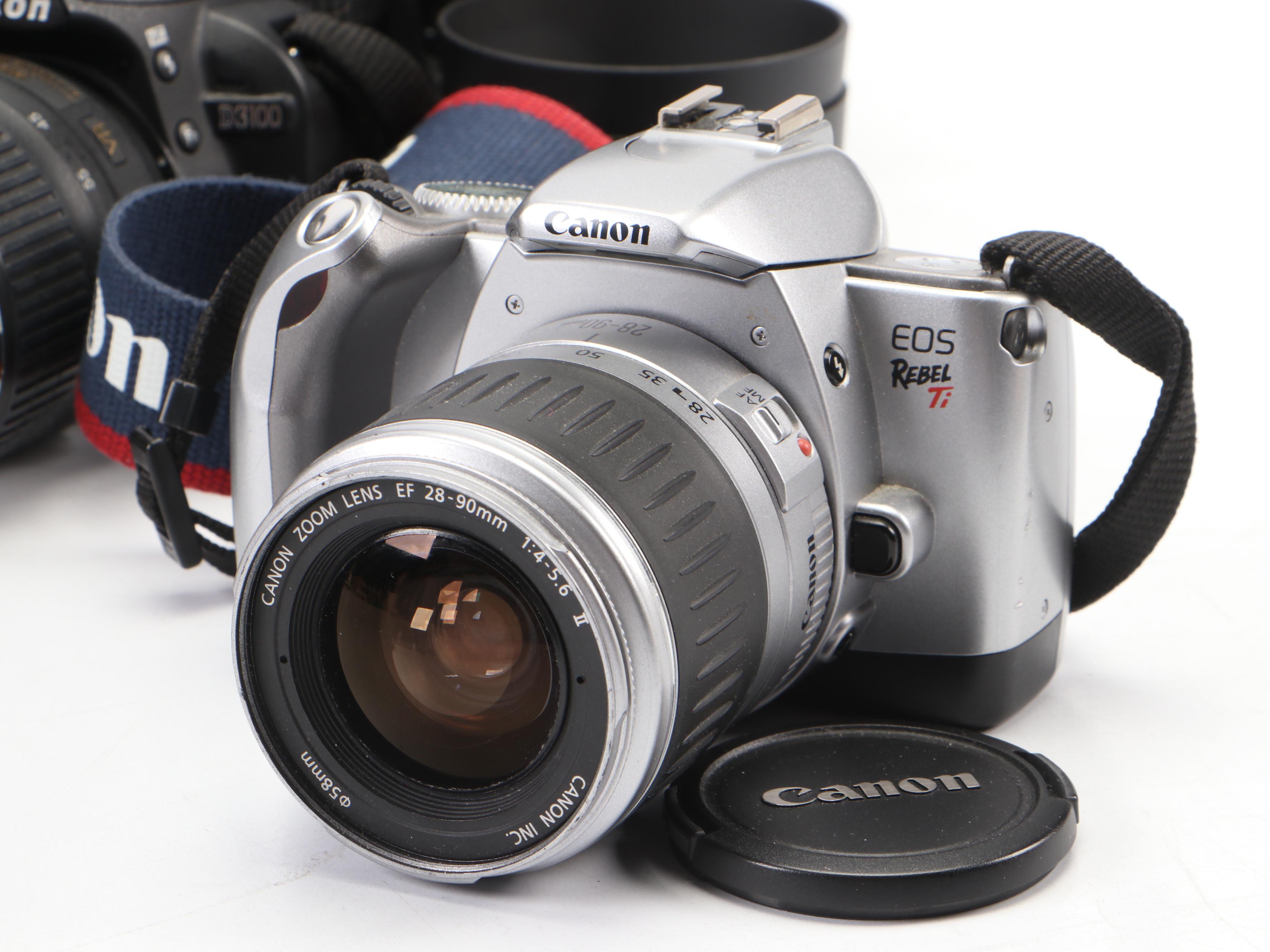 Canon EOS Rebel Ti Camera and Nikon D3100 With Accessories and Case