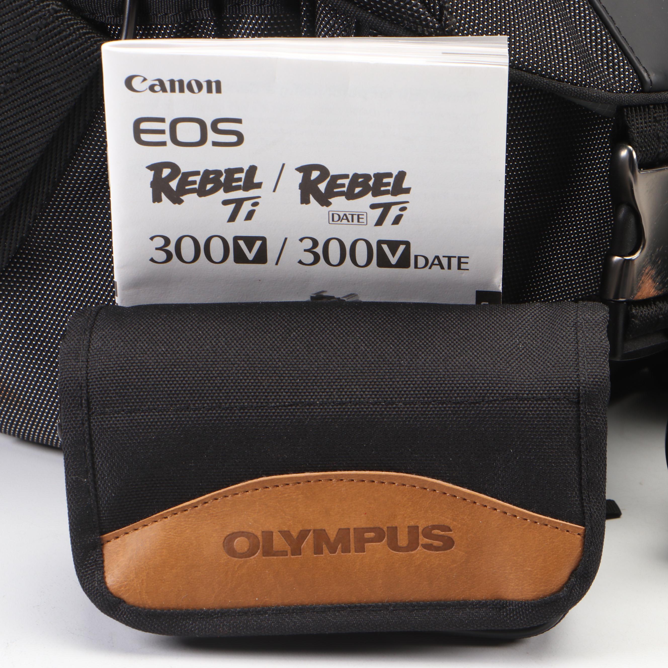 Canon EOS Rebel Ti Camera and Nikon D3100 With Accessories and Case