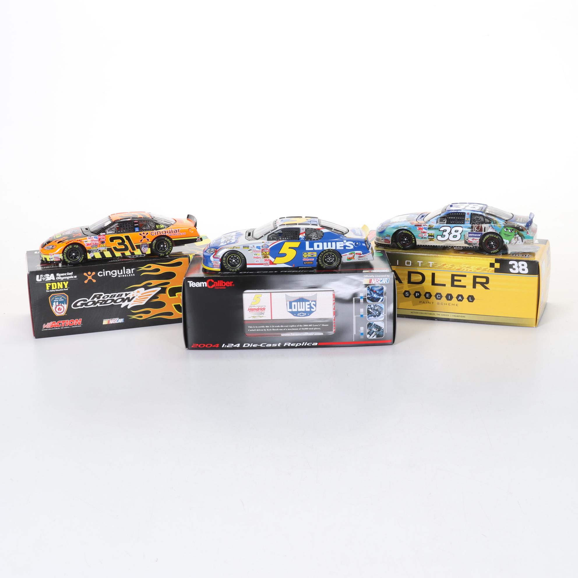 Three 1:24 Scale Die Cast NASCAR Cars Including Kyle Busch Autograph