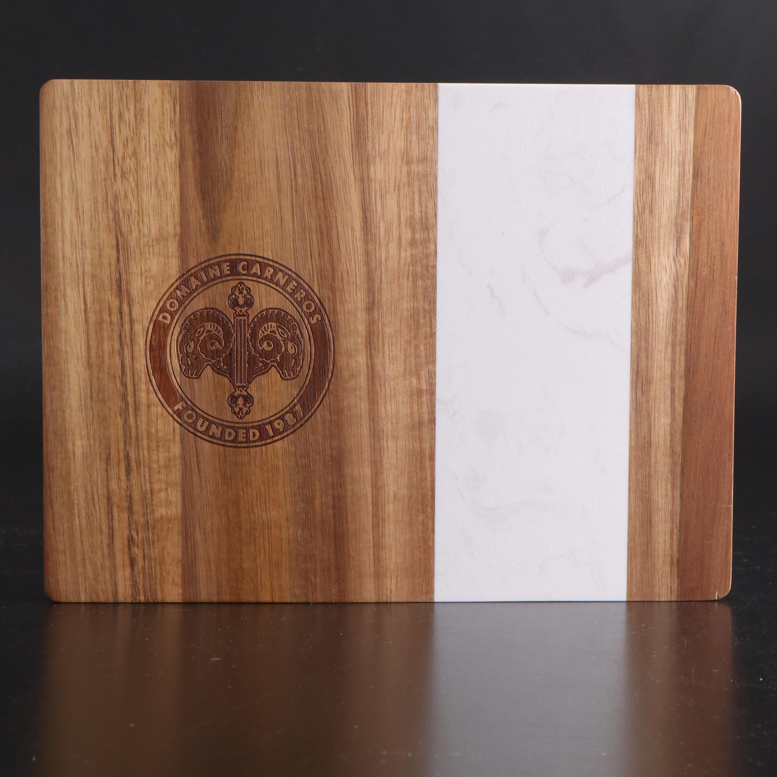 White Ceramic Serveware, Wood and Stone Cutting Board, and Metal Utensils