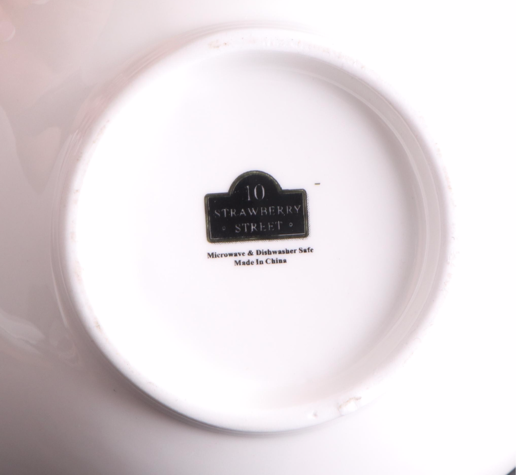 White Ceramic Serveware, Wood and Stone Cutting Board, and Metal Utensils