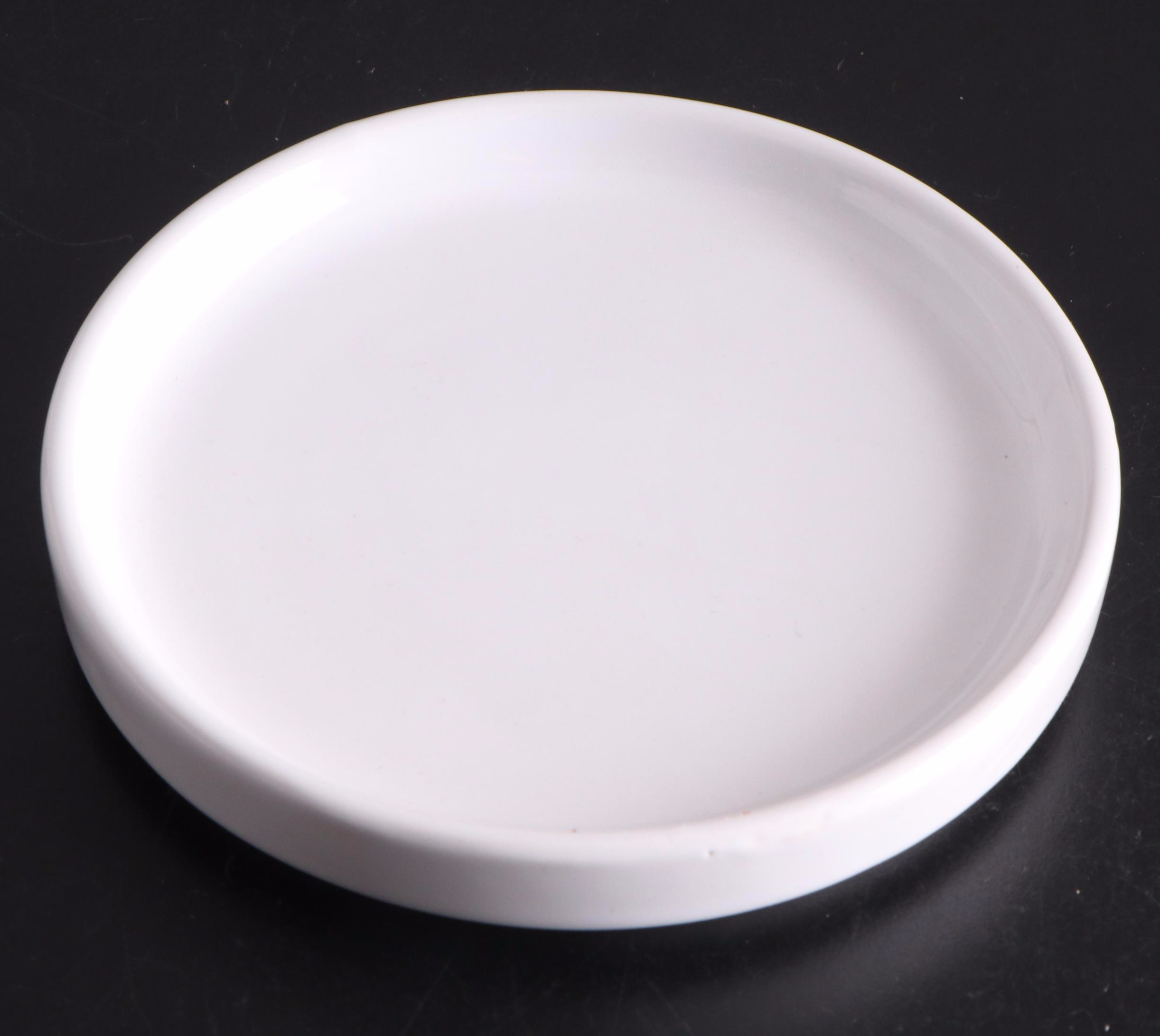 White Ceramic Serveware, Wood and Stone Cutting Board, and Metal Utensils