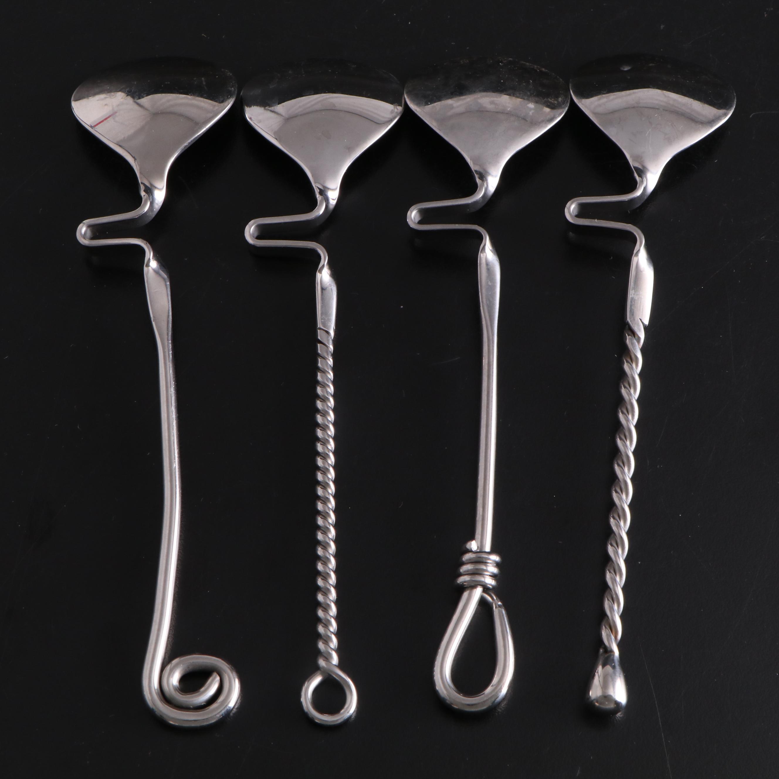 White Ceramic Serveware, Wood and Stone Cutting Board, and Metal Utensils