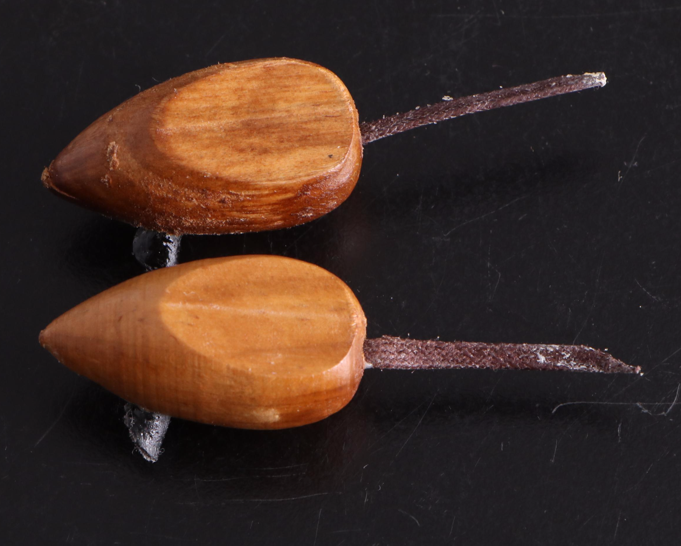 White Ceramic Serveware, Wood and Stone Cutting Board, and Metal Utensils