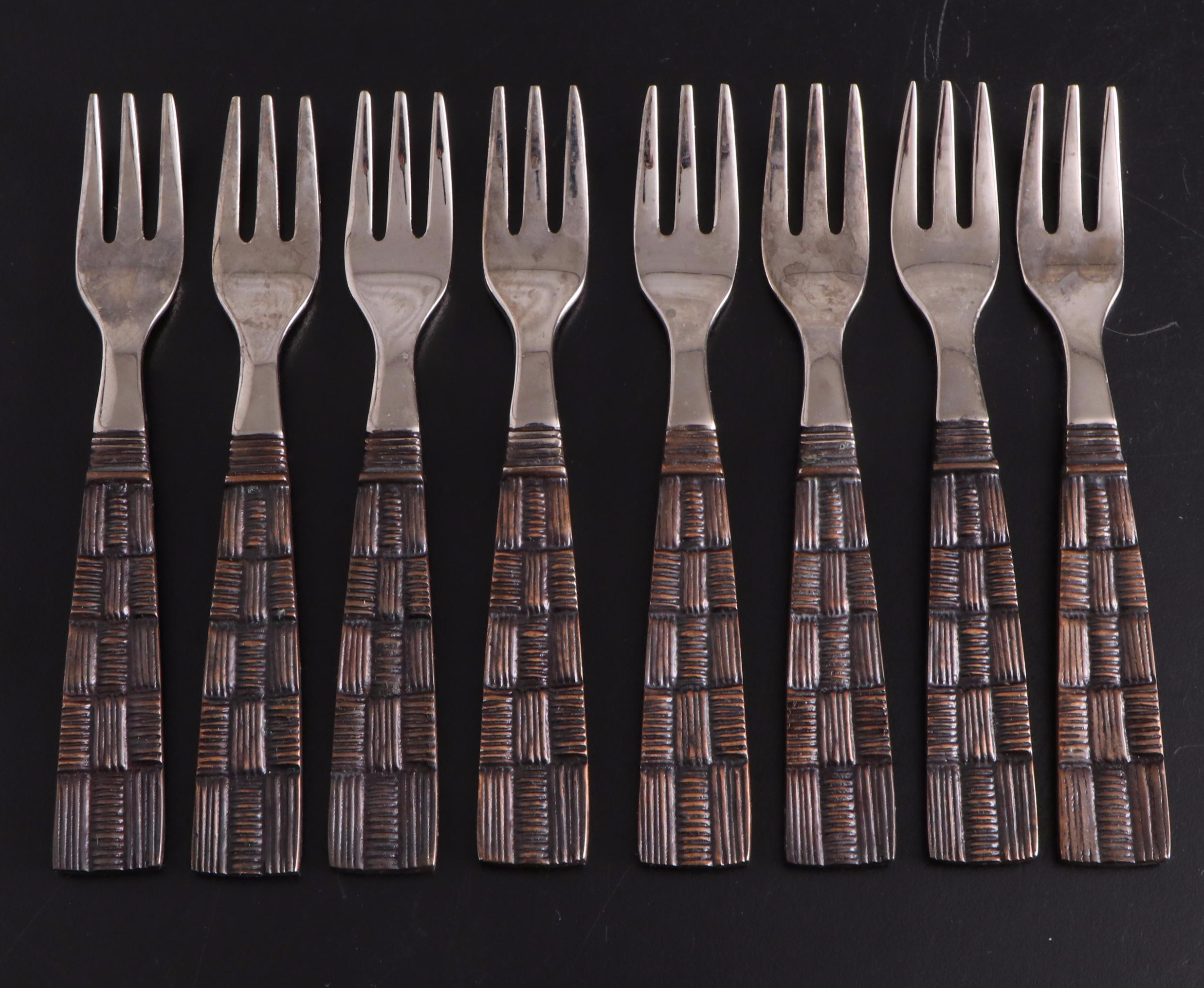 White Ceramic Serveware, Wood and Stone Cutting Board, and Metal Utensils