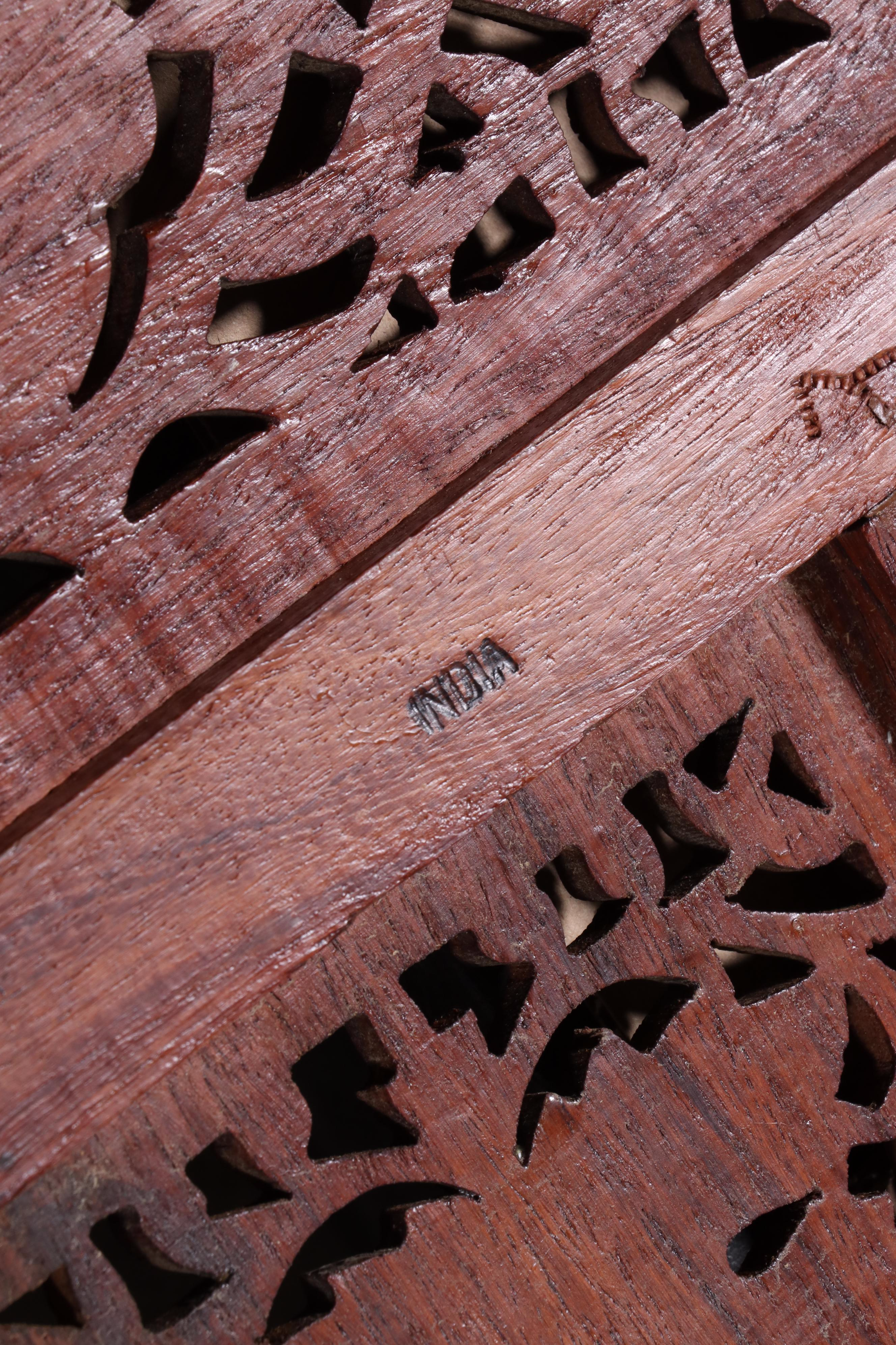 Pair of Indian Carved and Reticulated Teak Two-Panel Folding Screens