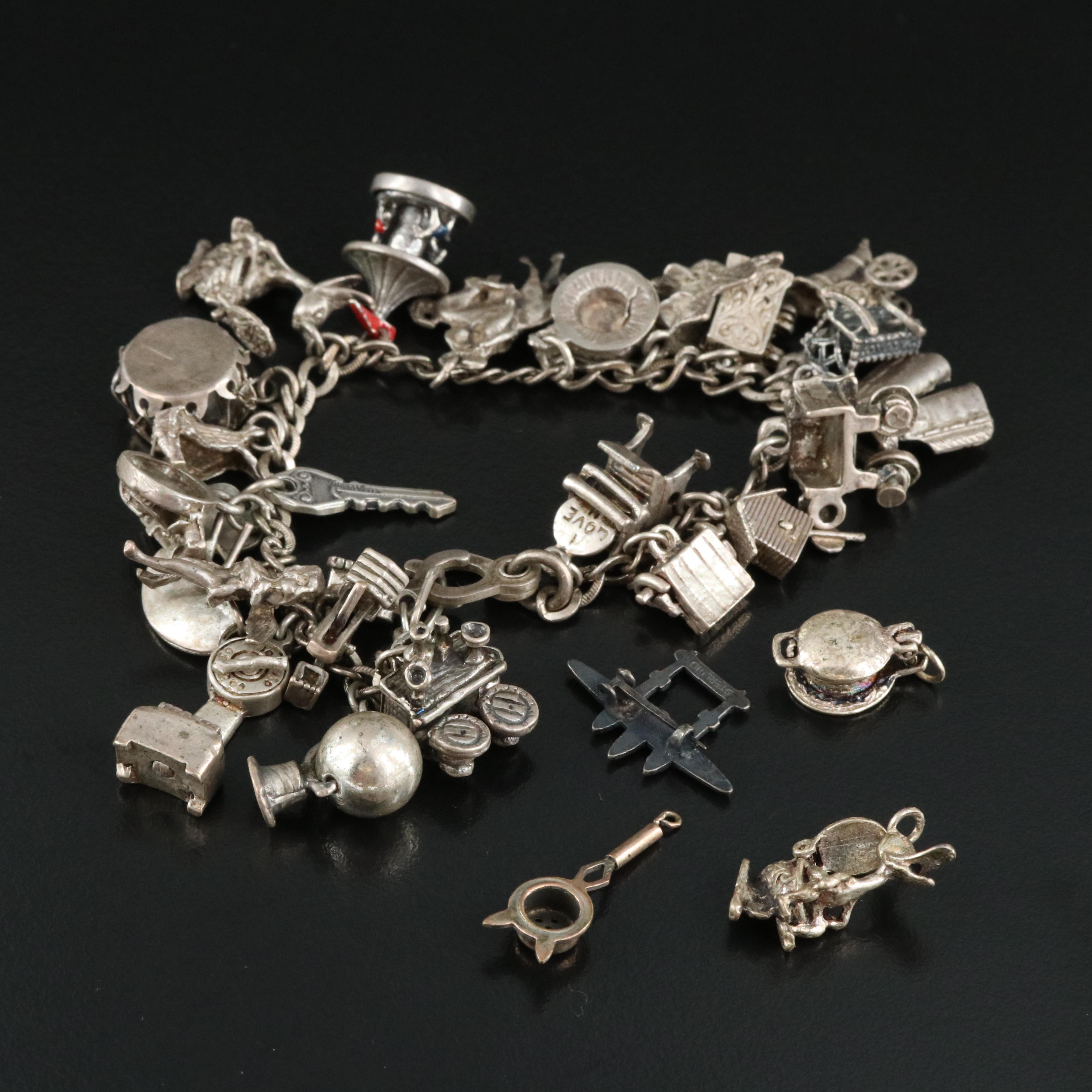 Vintage Sterling Charm Bracelet with Articulated Charms and Airplane Pin