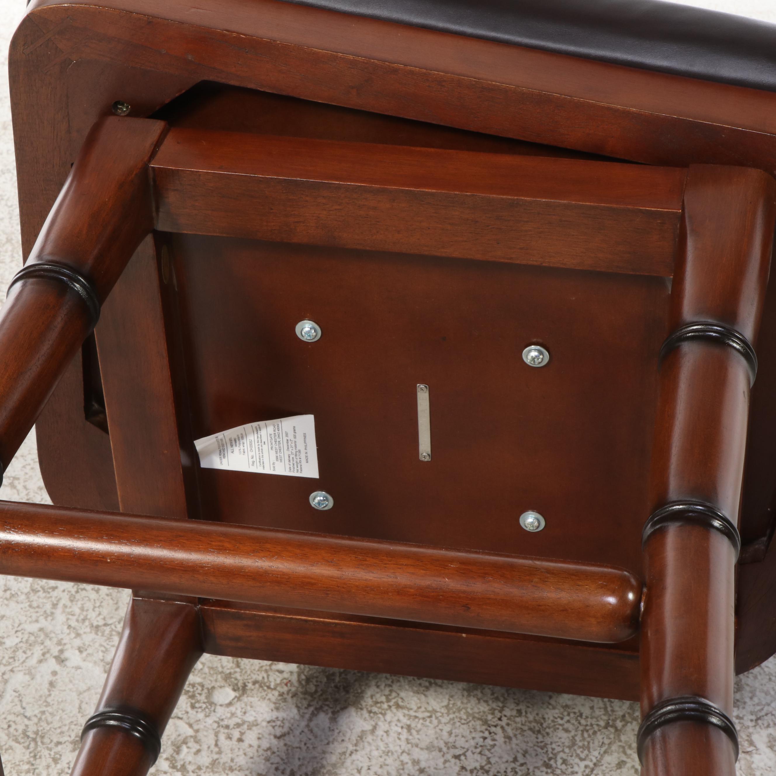 Three Frontgate Faux-Bamboo and Leather Swivel Bar Stools