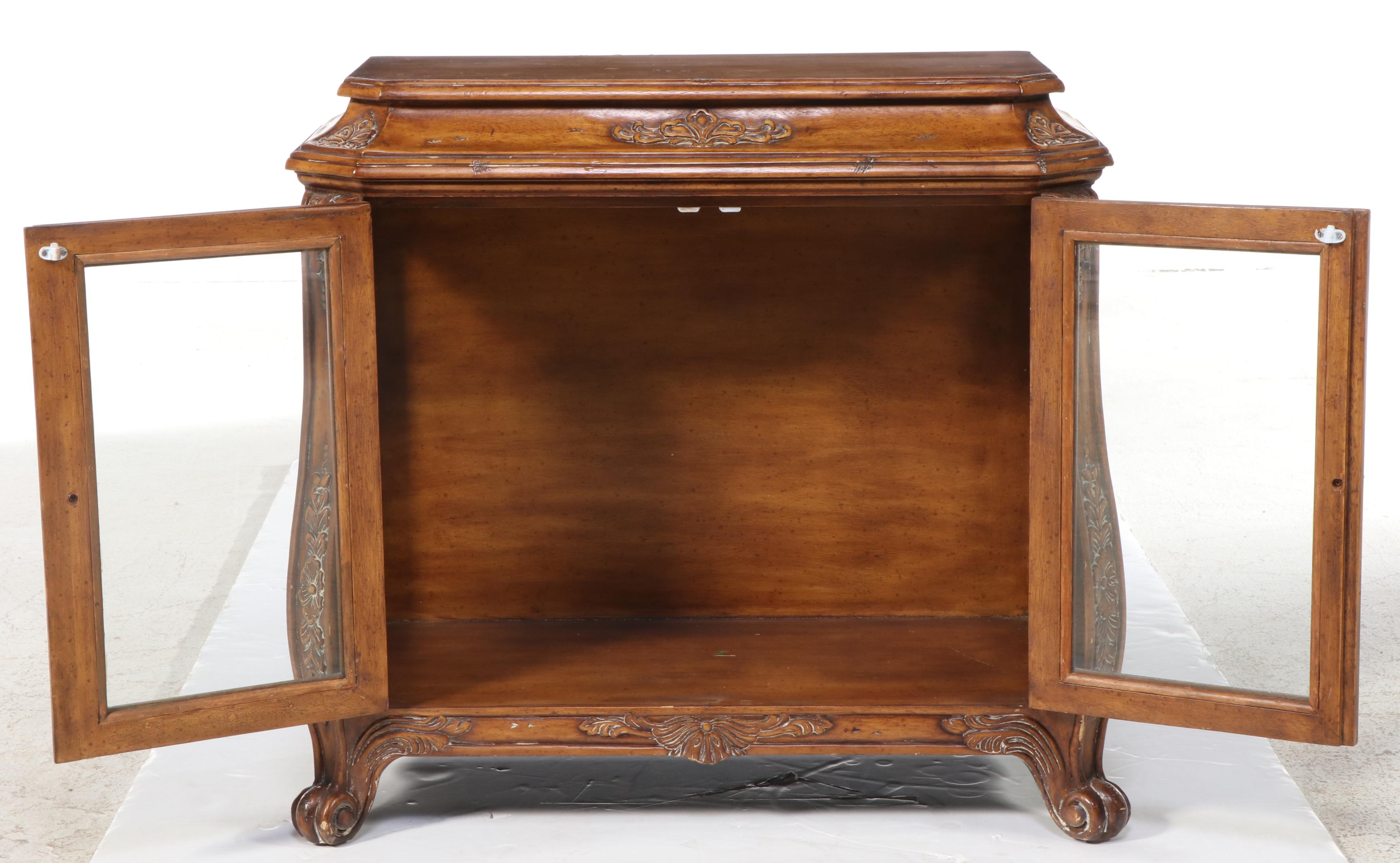 Butler Specialty Co. Hardwood and Glass Bombe-Form Curio Cabinet