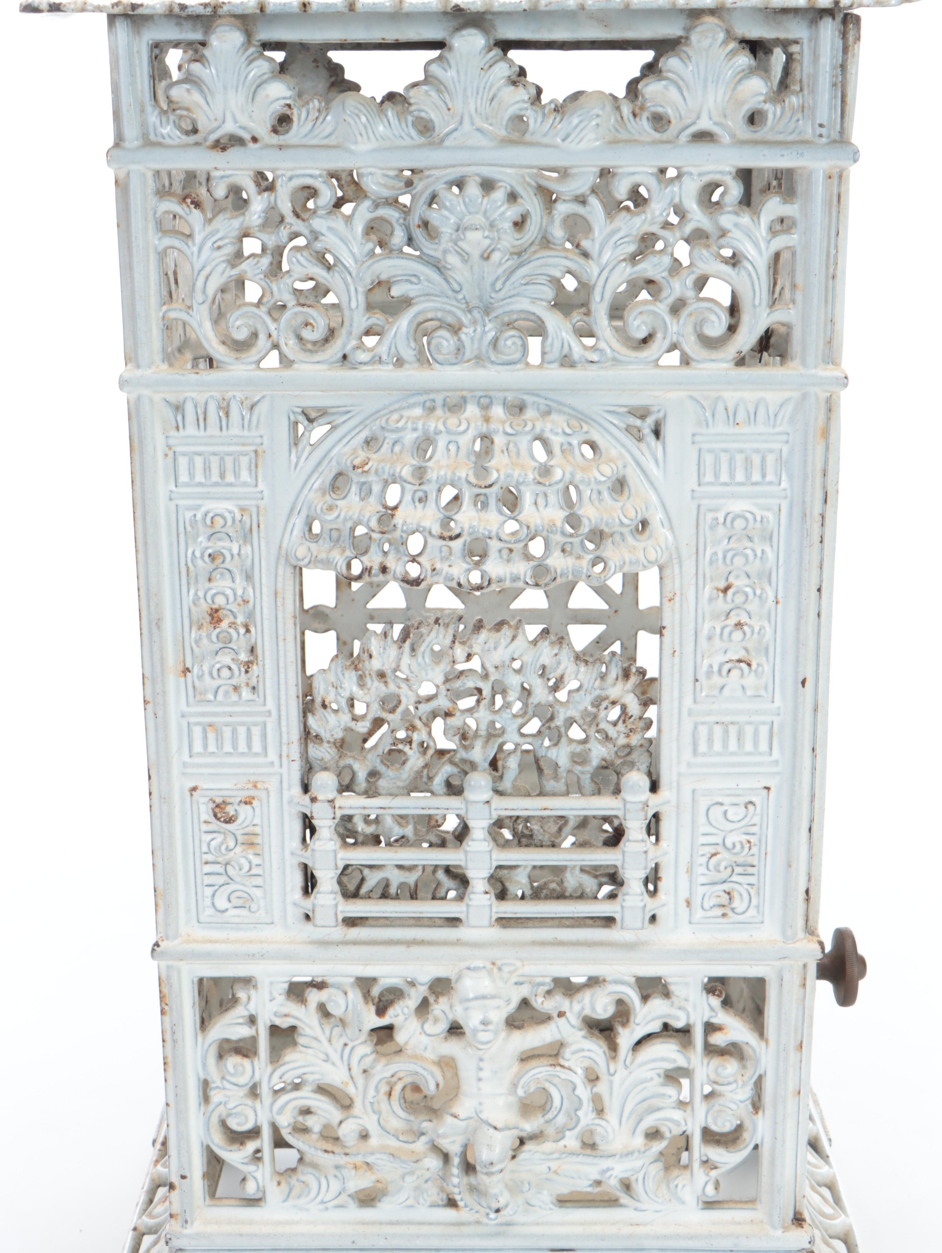 Ornate Enameled Cast Iron Veritas Stove Heater