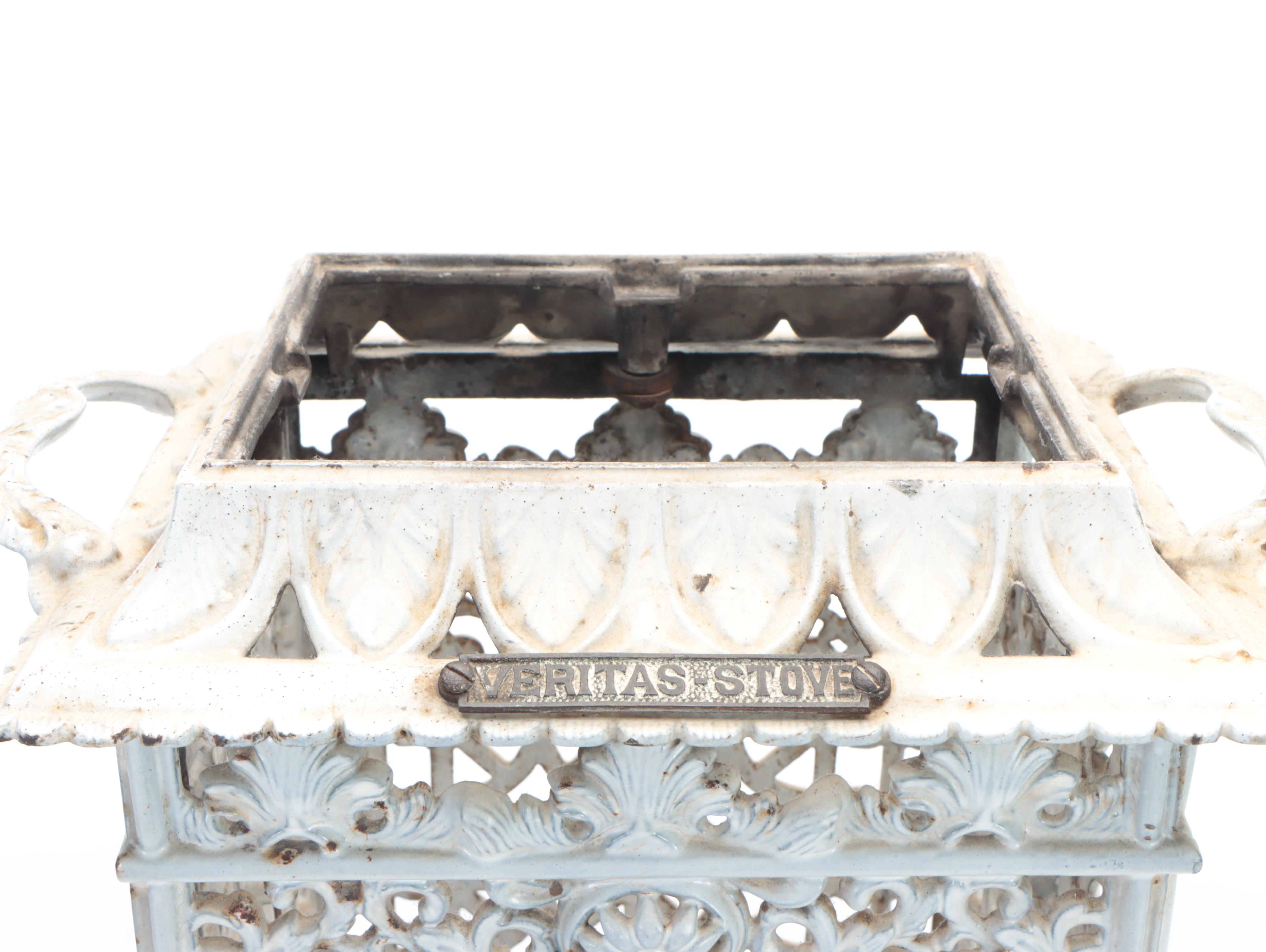 Ornate Enameled Cast Iron Veritas Stove Heater