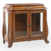 Butler Specialty Co. Hardwood and Glass Bombe-Form Curio Cabinet