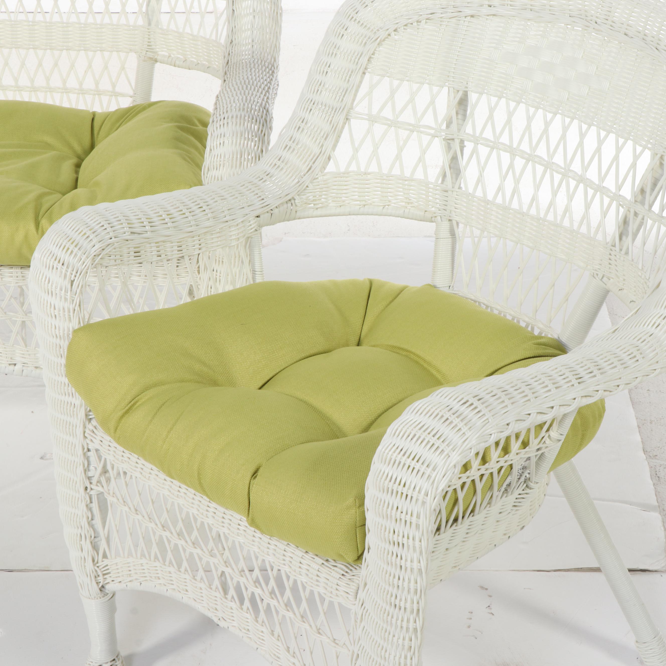 Four-Piece White Resin Wicker Patio Furniture Set