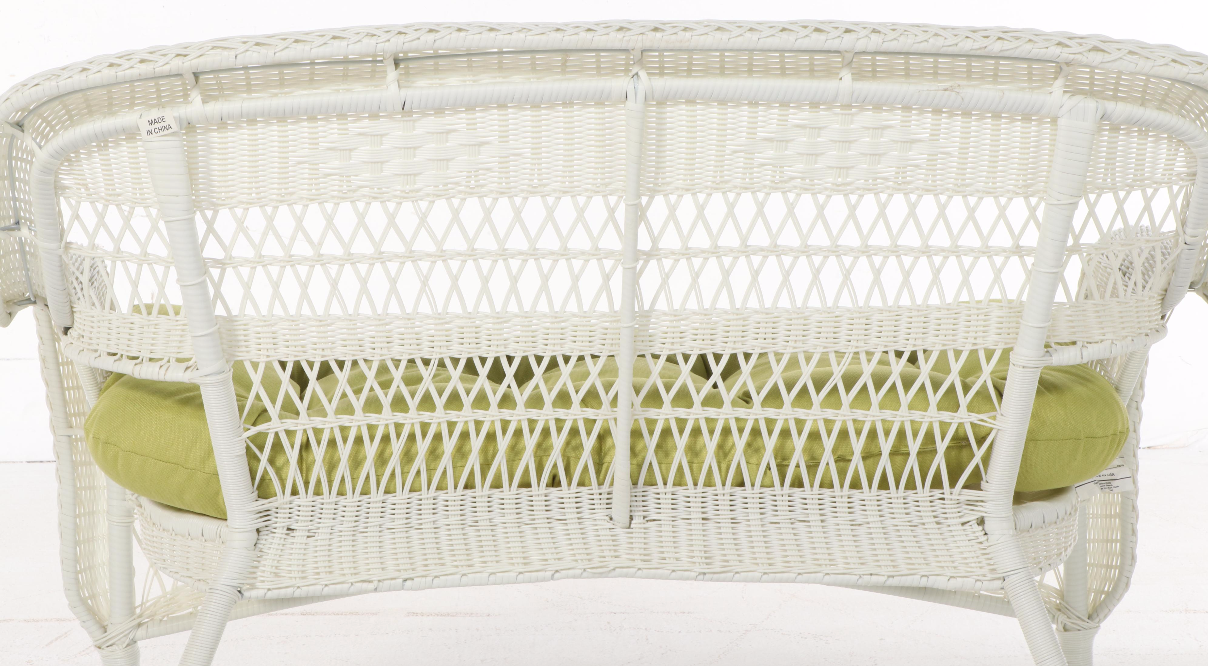 Four-Piece White Resin Wicker Patio Furniture Set