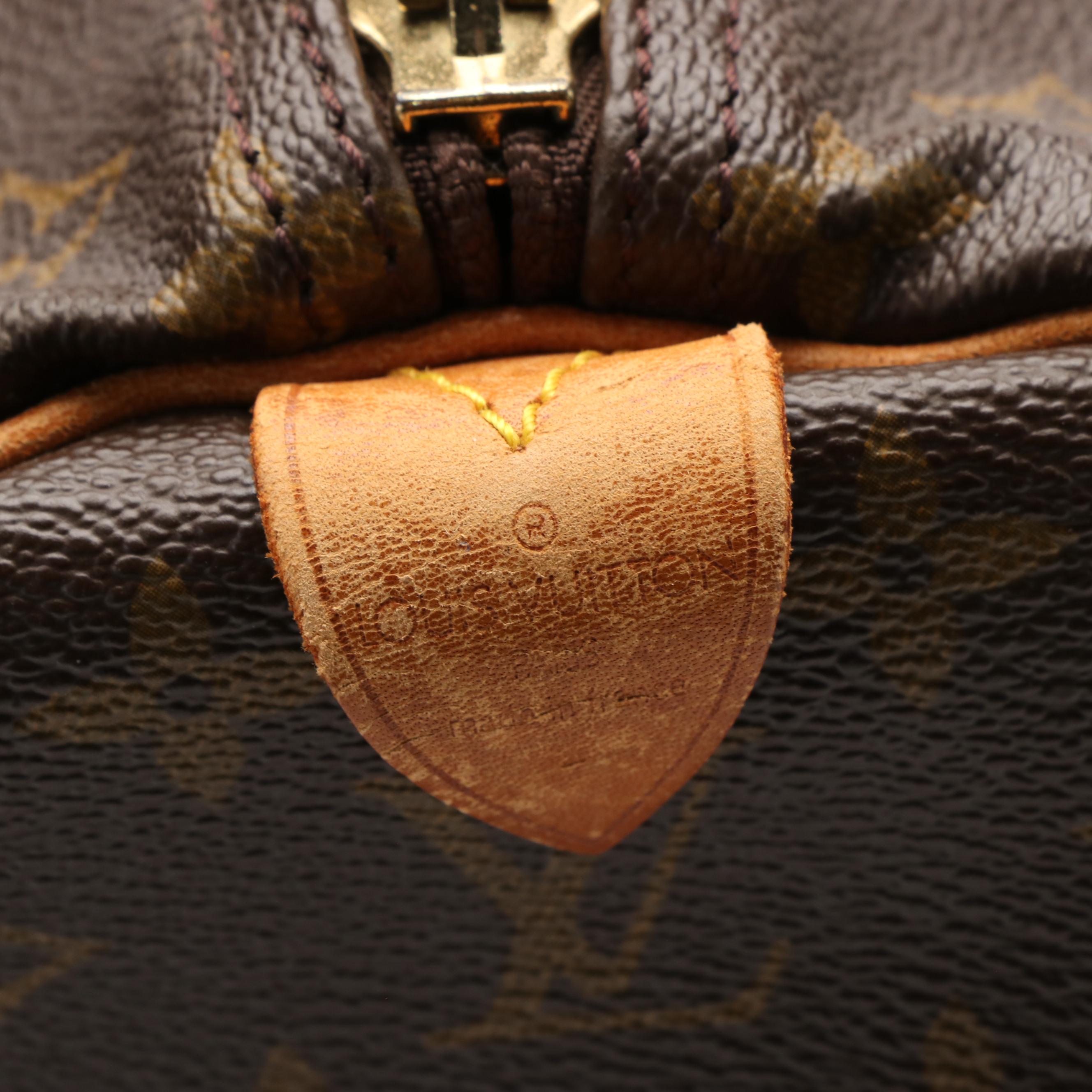 Louis Vuitton Keepall 60 Duffel Bag in Monogram Coated Canvas