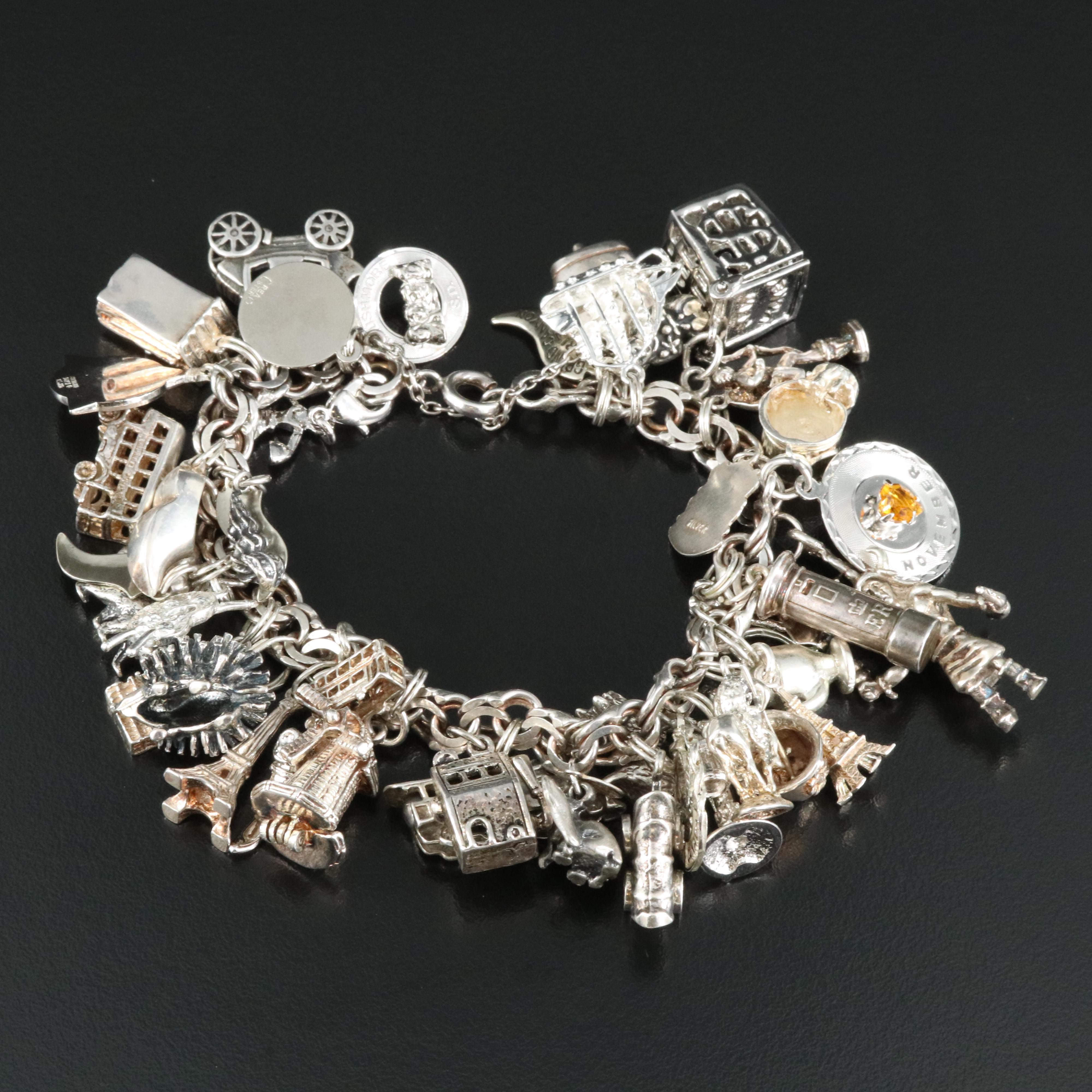 Sterling Charm Bracelet Including Disney's Dumbo, Travel and Articulated