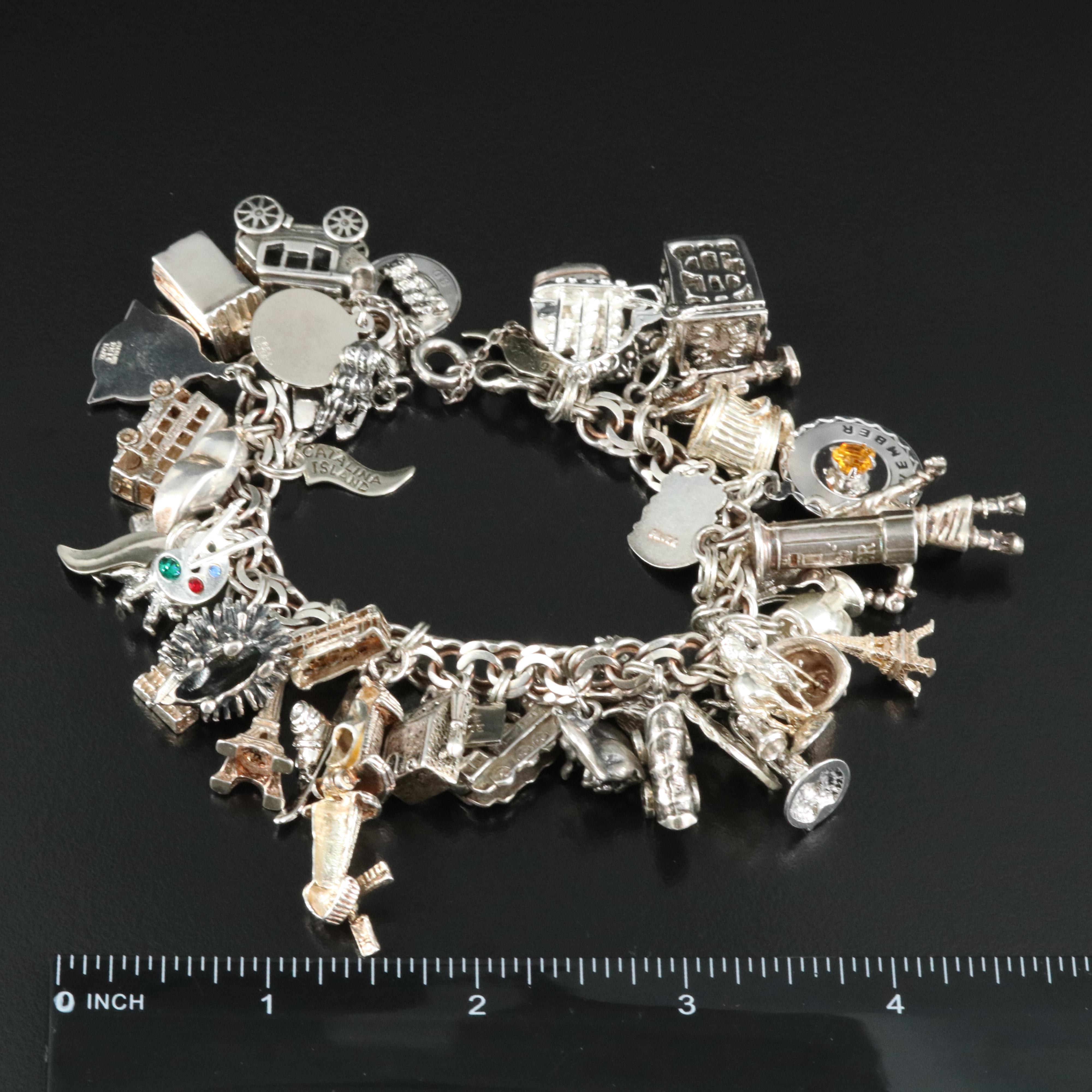 Sterling Charm Bracelet Including Disney's Dumbo, Travel and Articulated