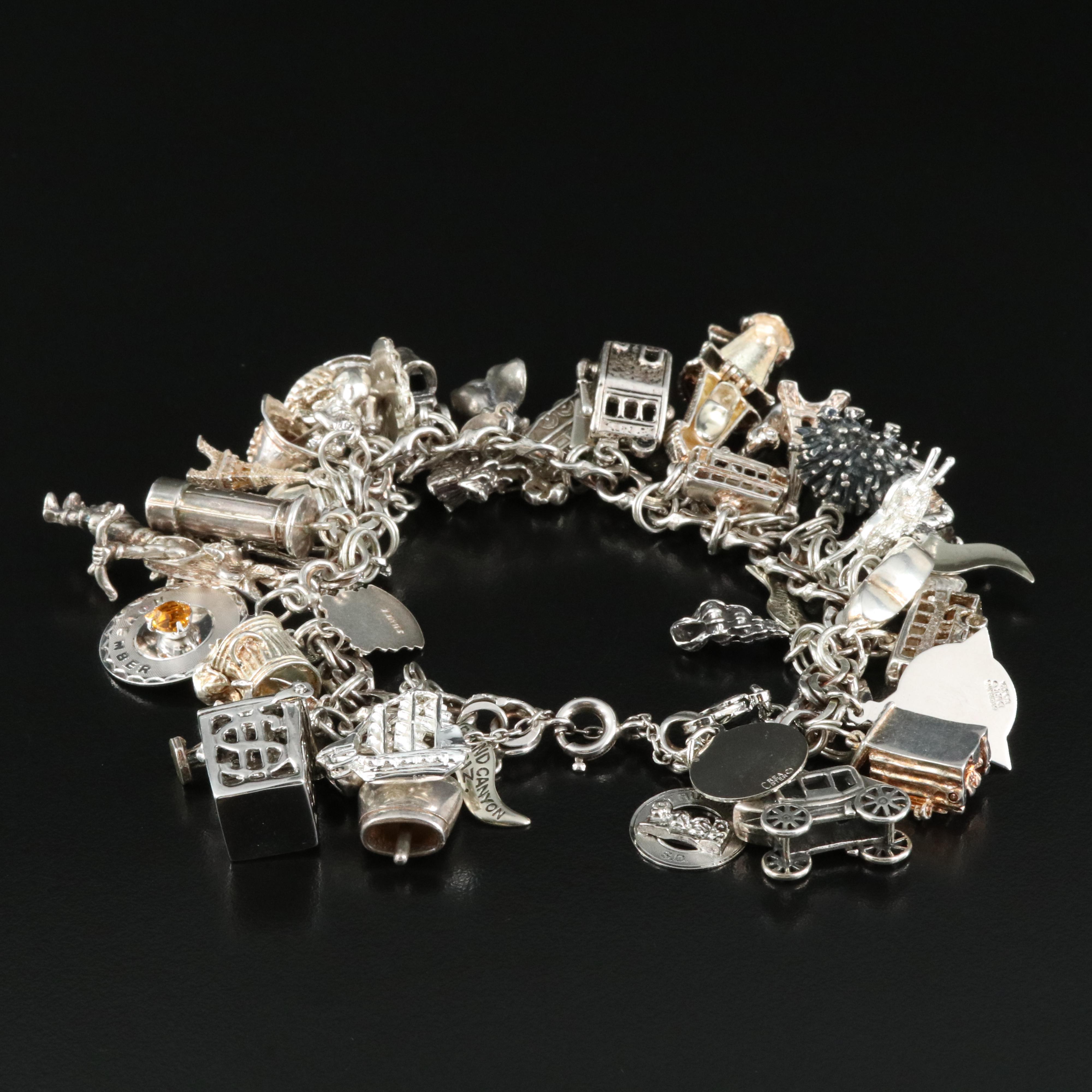 Sterling Charm Bracelet Including Disney's Dumbo, Travel and Articulated