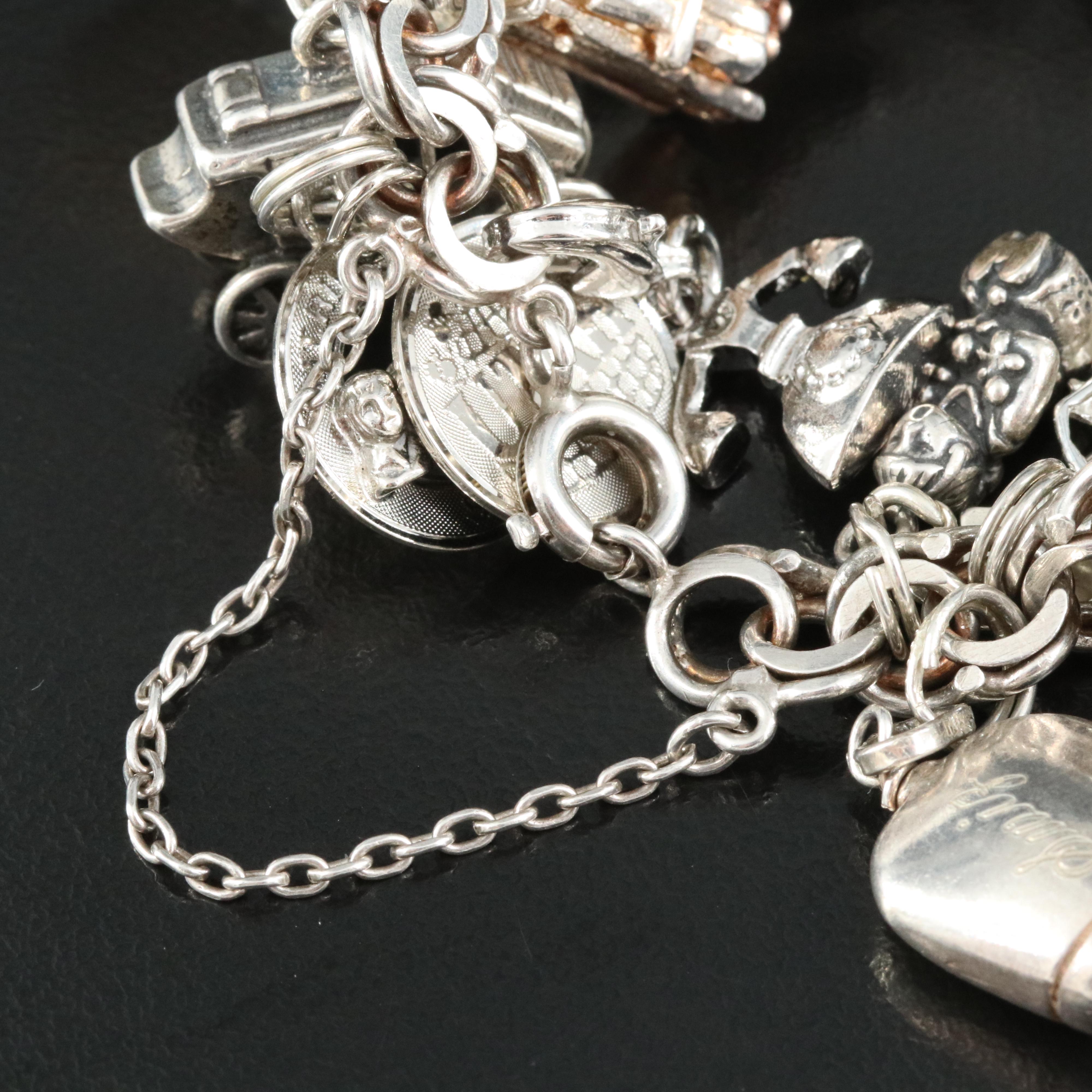 Sterling Charm Bracelet Including Disney's Dumbo, Travel and Articulated
