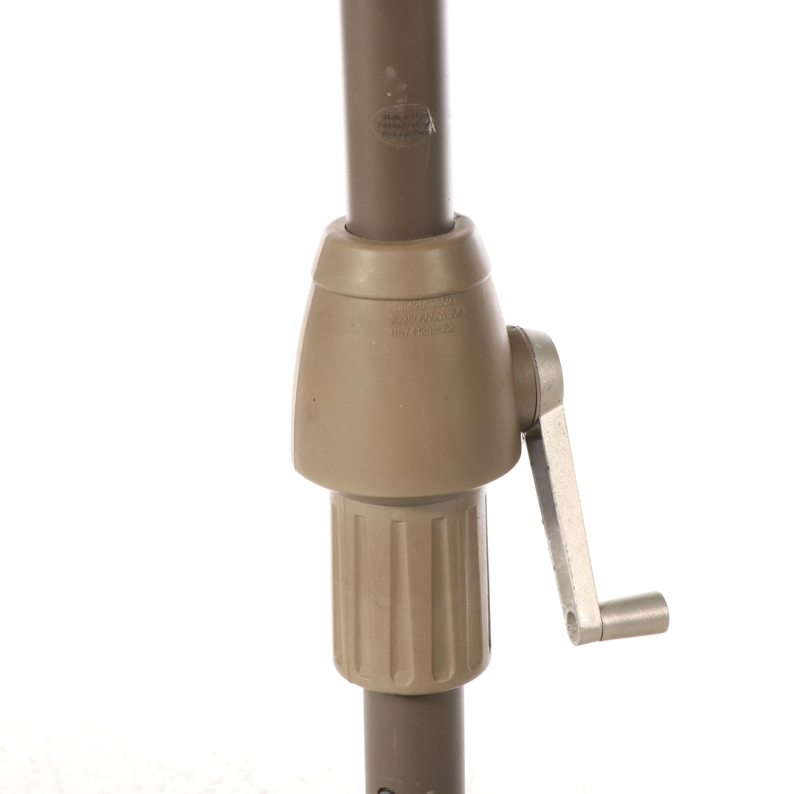 Sunbrella Green Patio Umbrella with Rolling Base