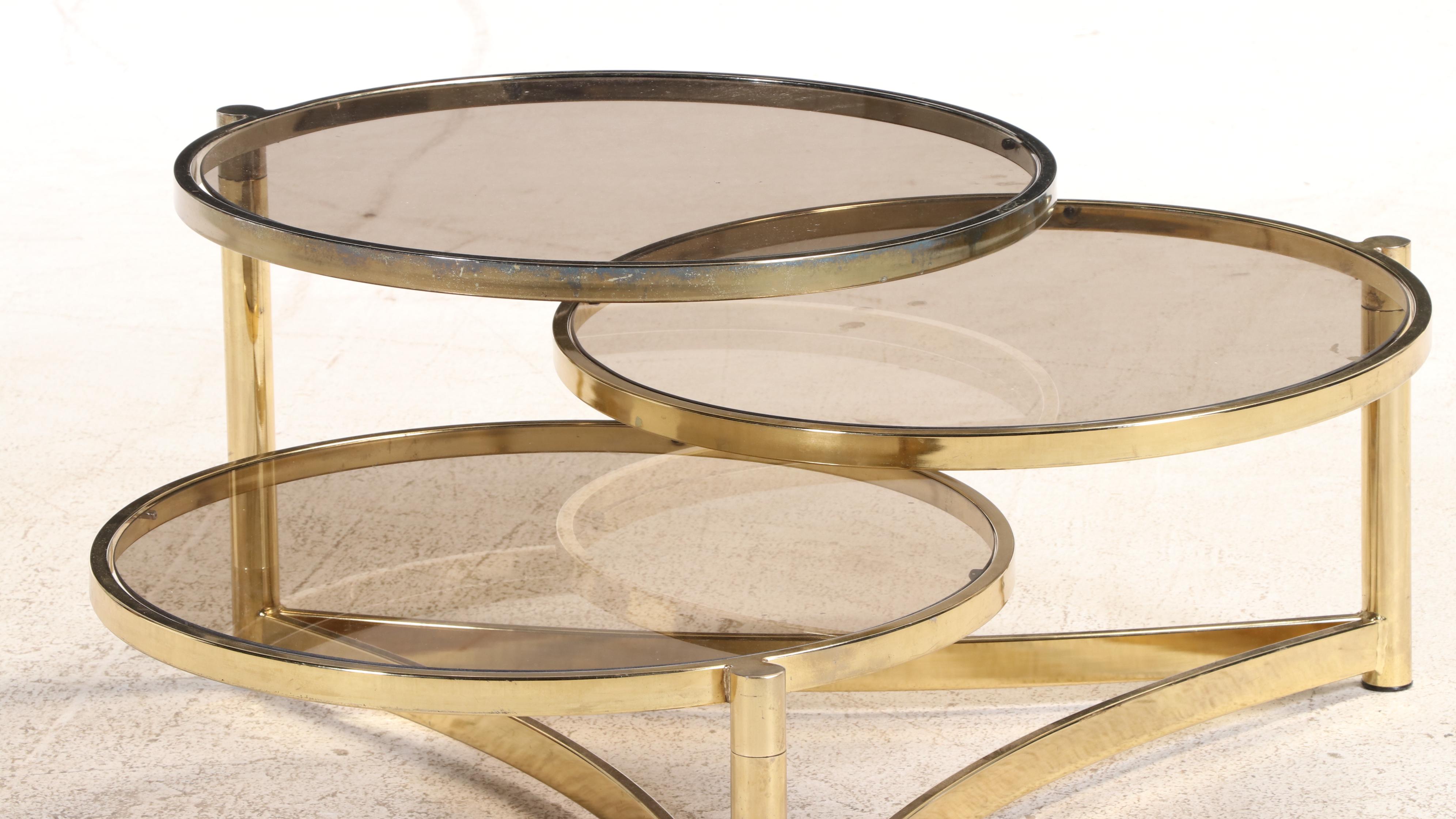 Modernist Brass-Patinated and Smoked Glass Three-Tier Swivel-Top Coffee Table