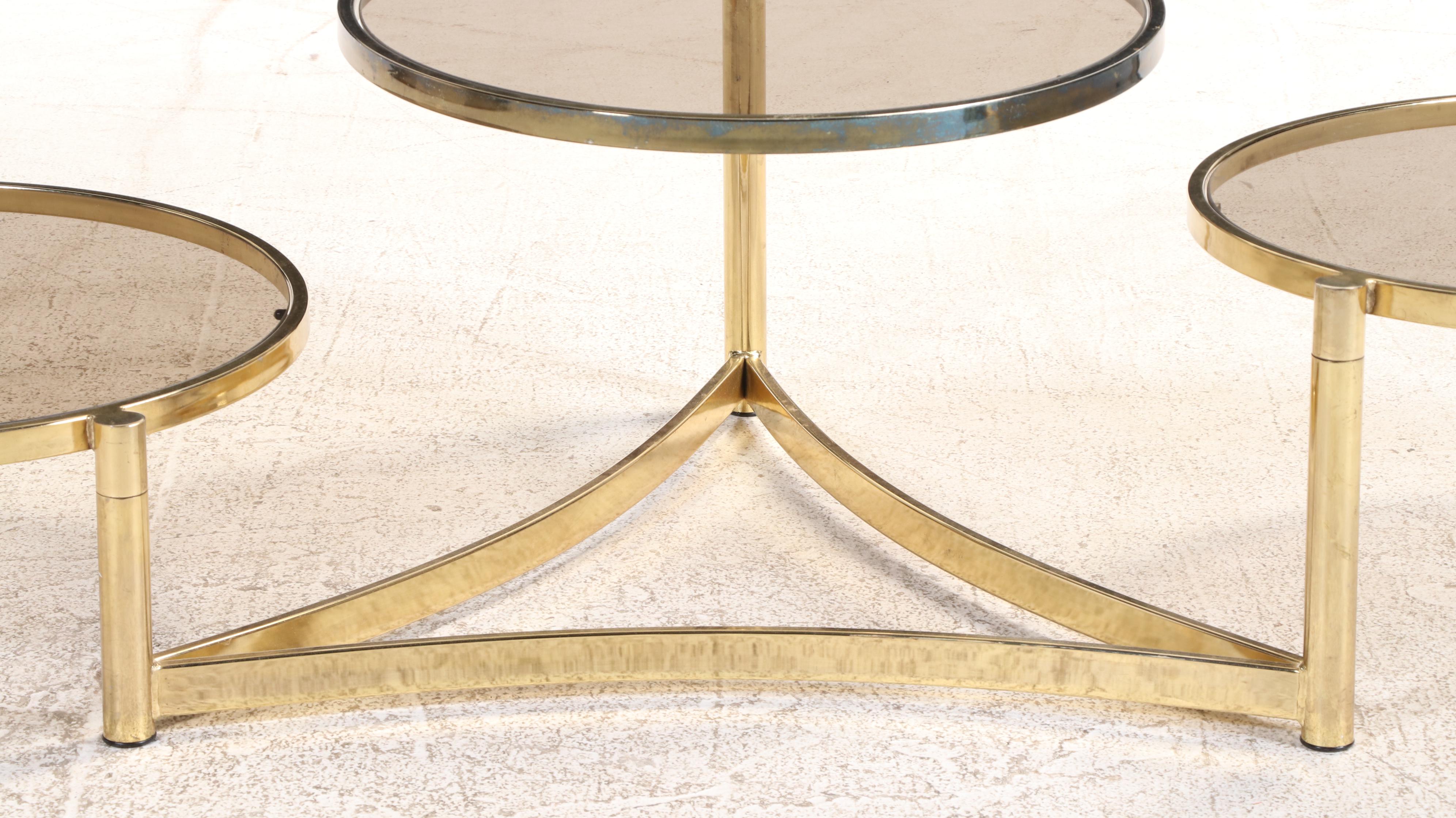 Modernist Brass-Patinated and Smoked Glass Three-Tier Swivel-Top Coffee Table