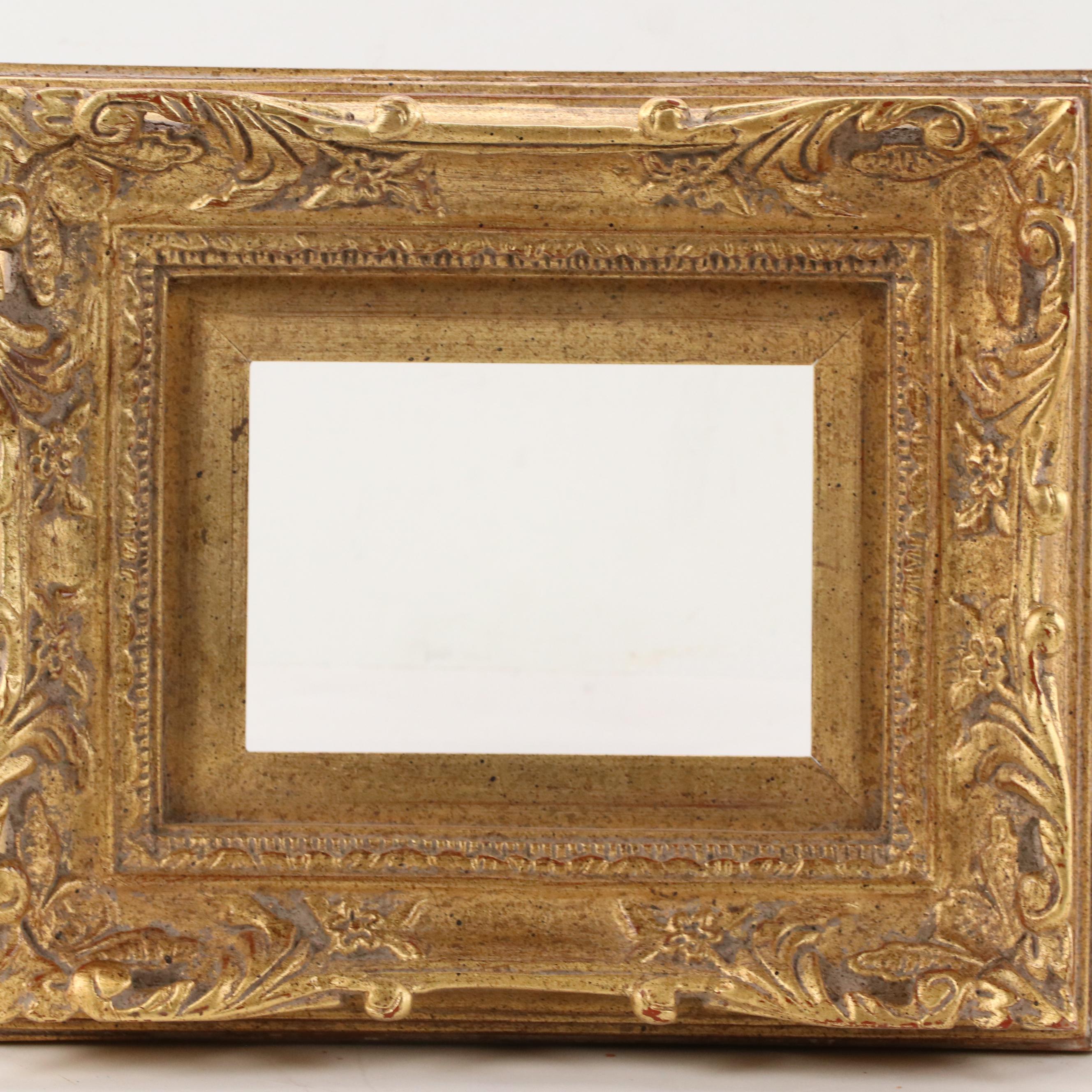 Carved Wood Frame With Scrolled Corners and Gilt Finish