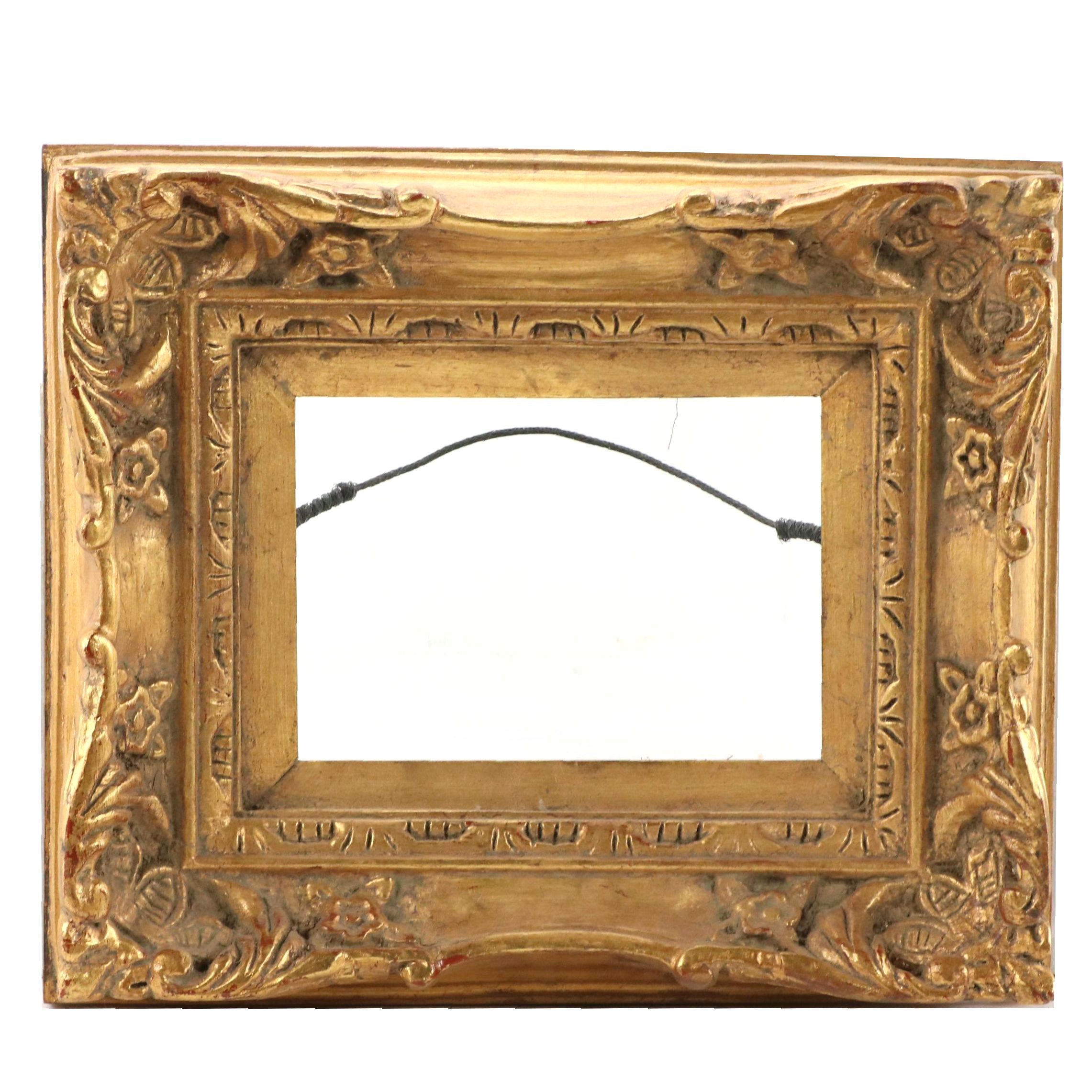 Carved Wood Frame With Scrolled Corners and Gilt Finish