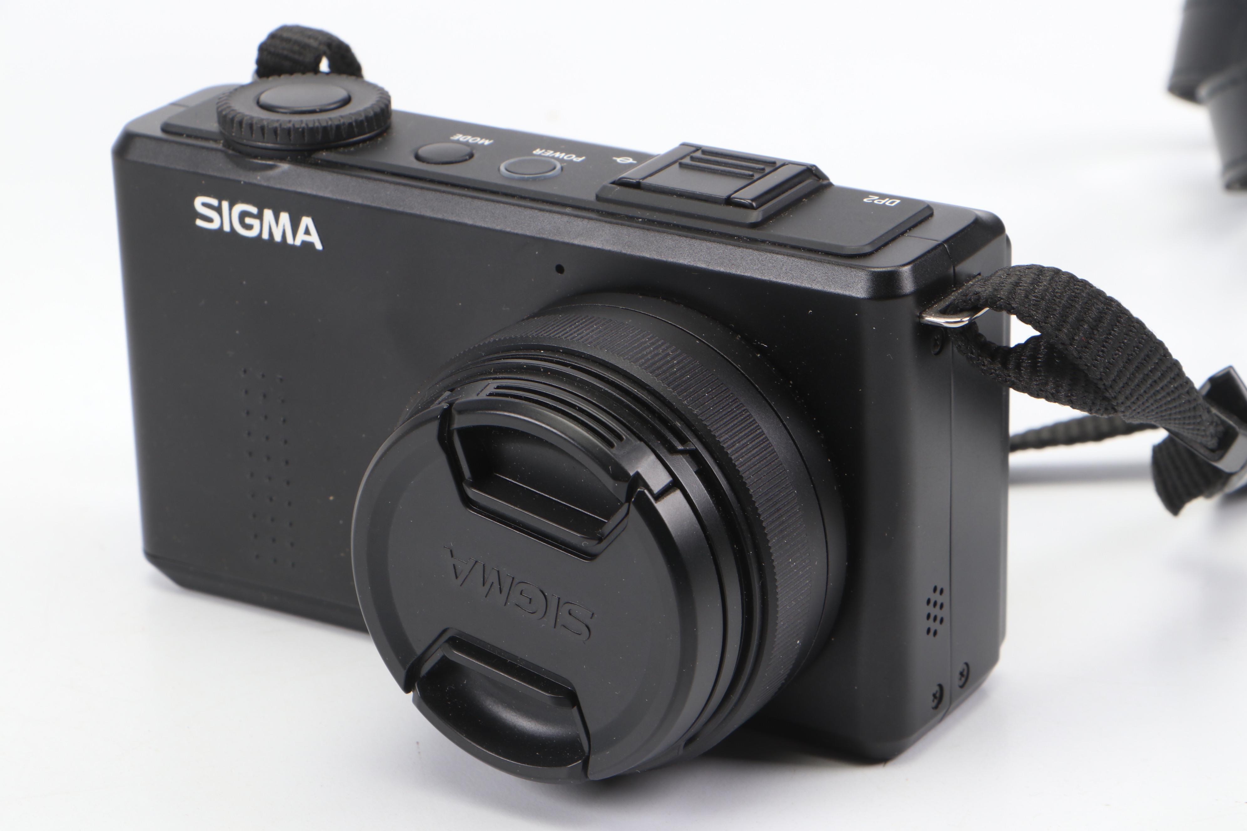 Nikon Coolpix 995 and Sigma DP2 Cameras