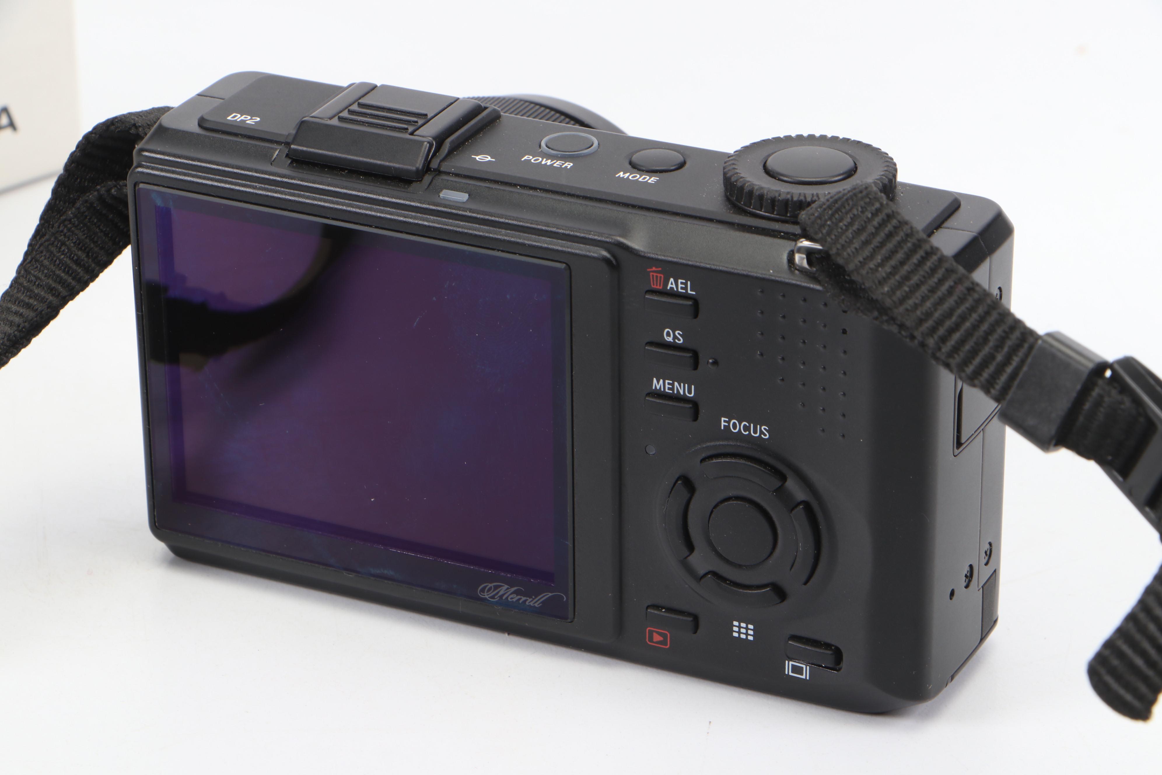 Nikon Coolpix 995 and Sigma DP2 Cameras