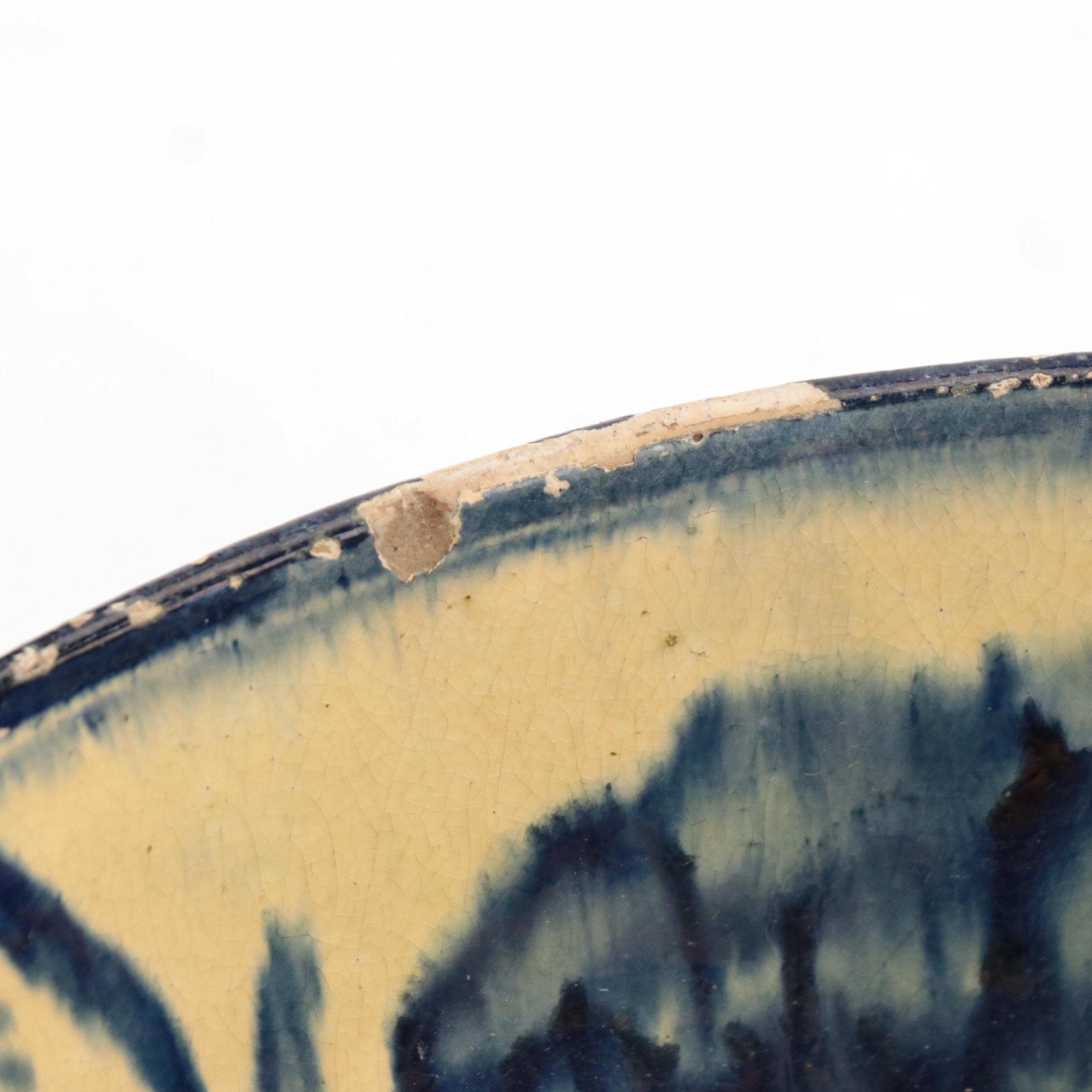 Persian Earthenware Yellow Ground and Blue Glazed Bowl