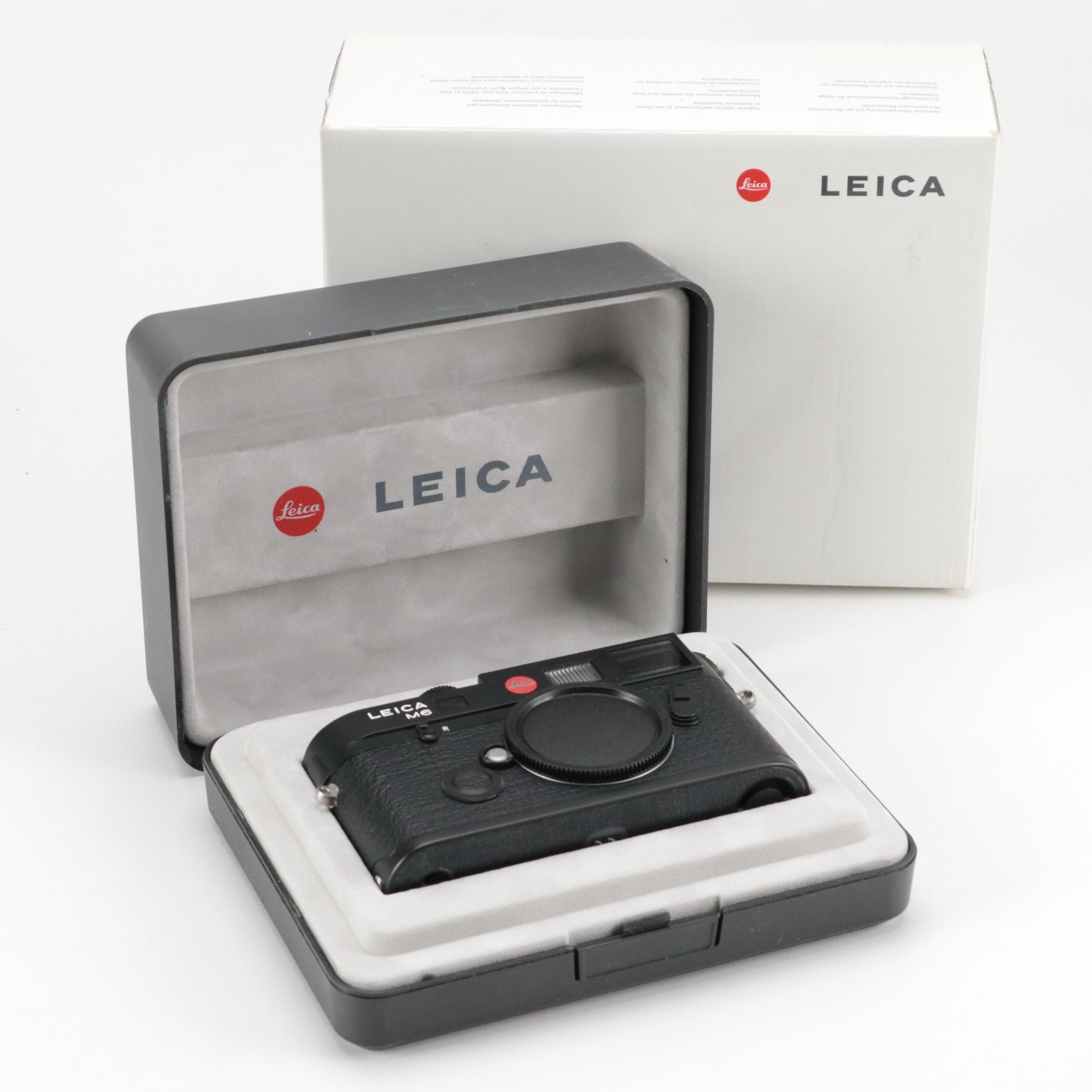 Leica M6, Digilux 3 and Mini Camera With Lenses, Battery Charger and More