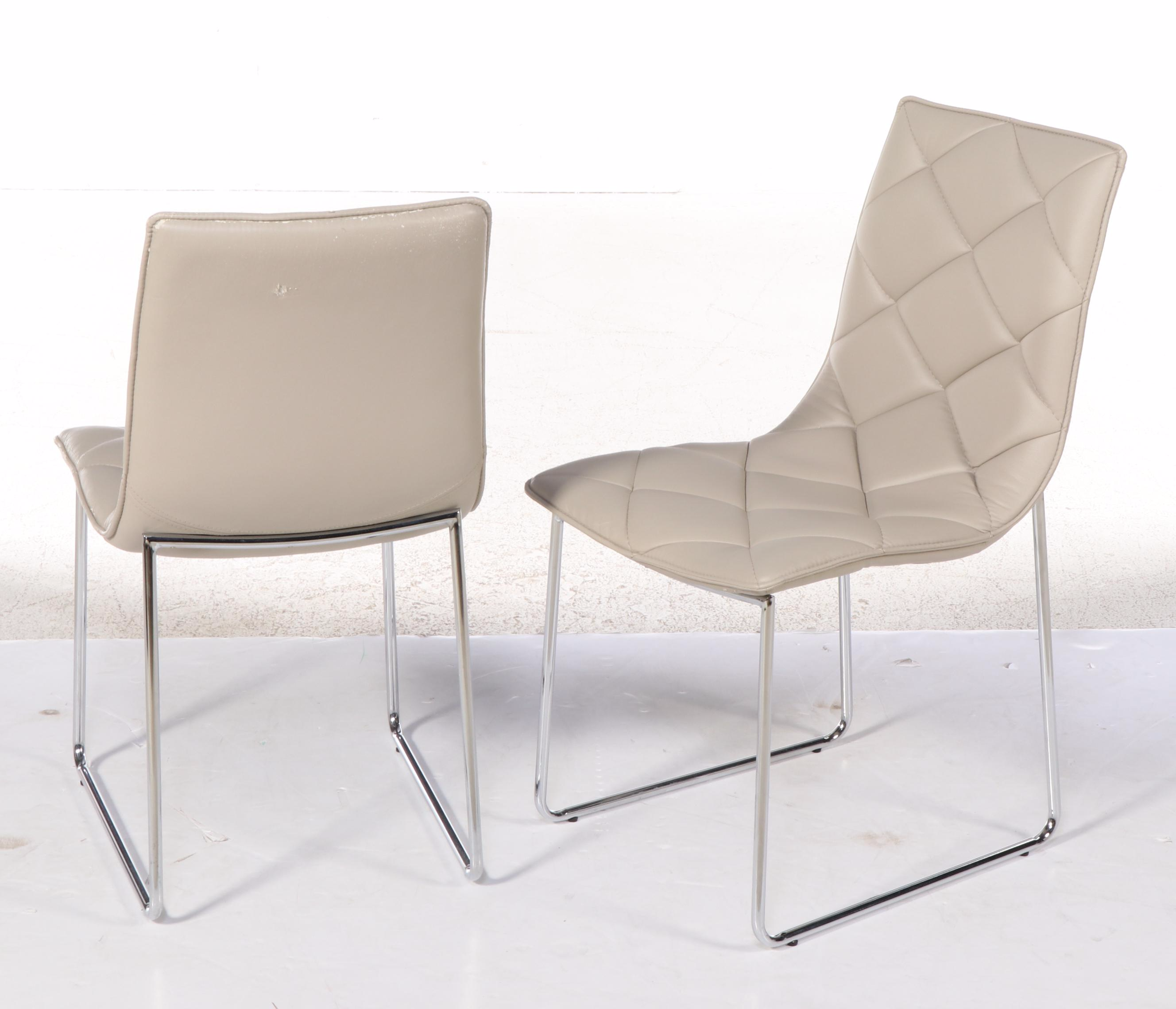 Four Modernist Style Chrome and Faux-Leather Sled-Base Dining Side Chairs