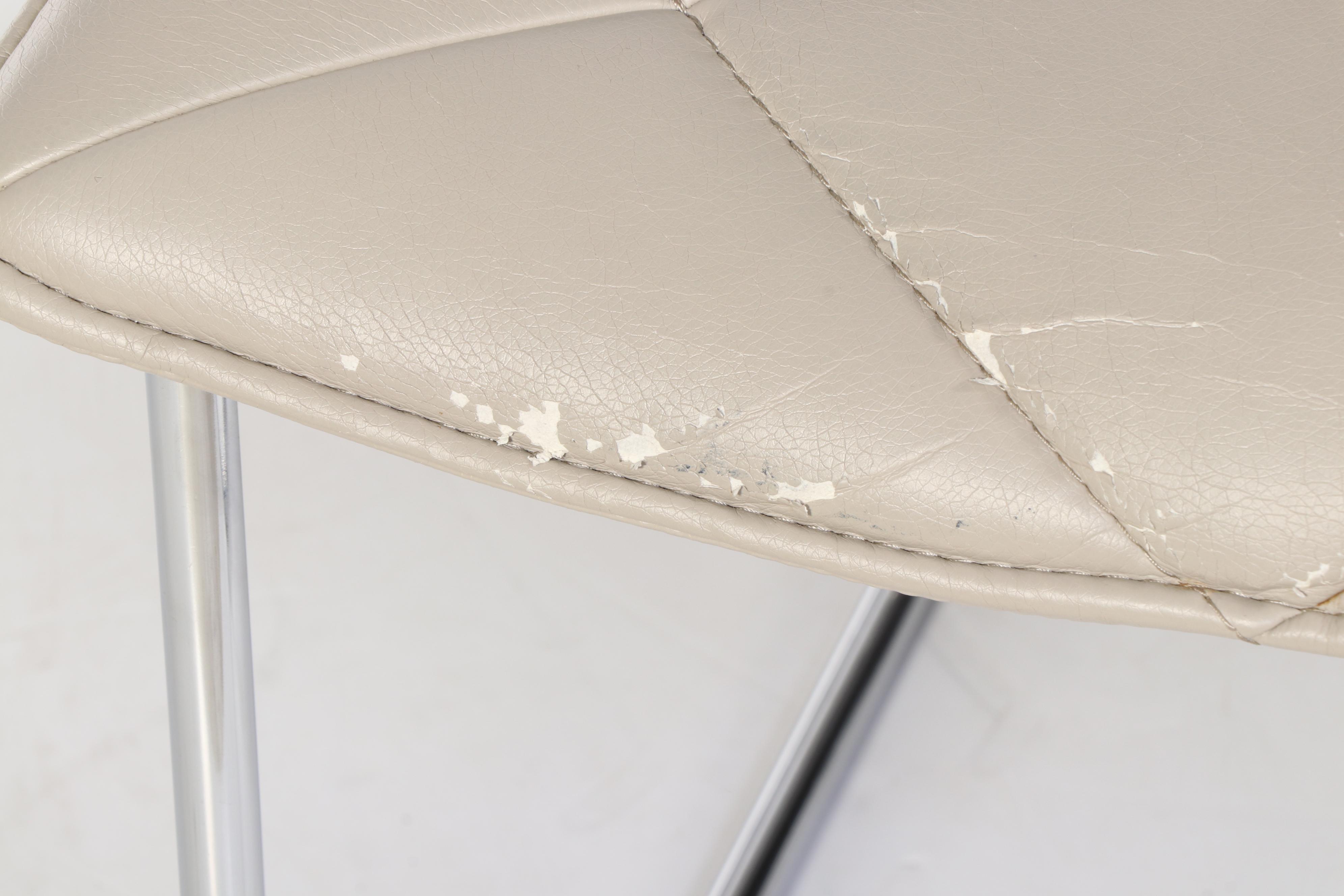 Four Modernist Style Chrome and Faux-Leather Sled-Base Dining Side Chairs