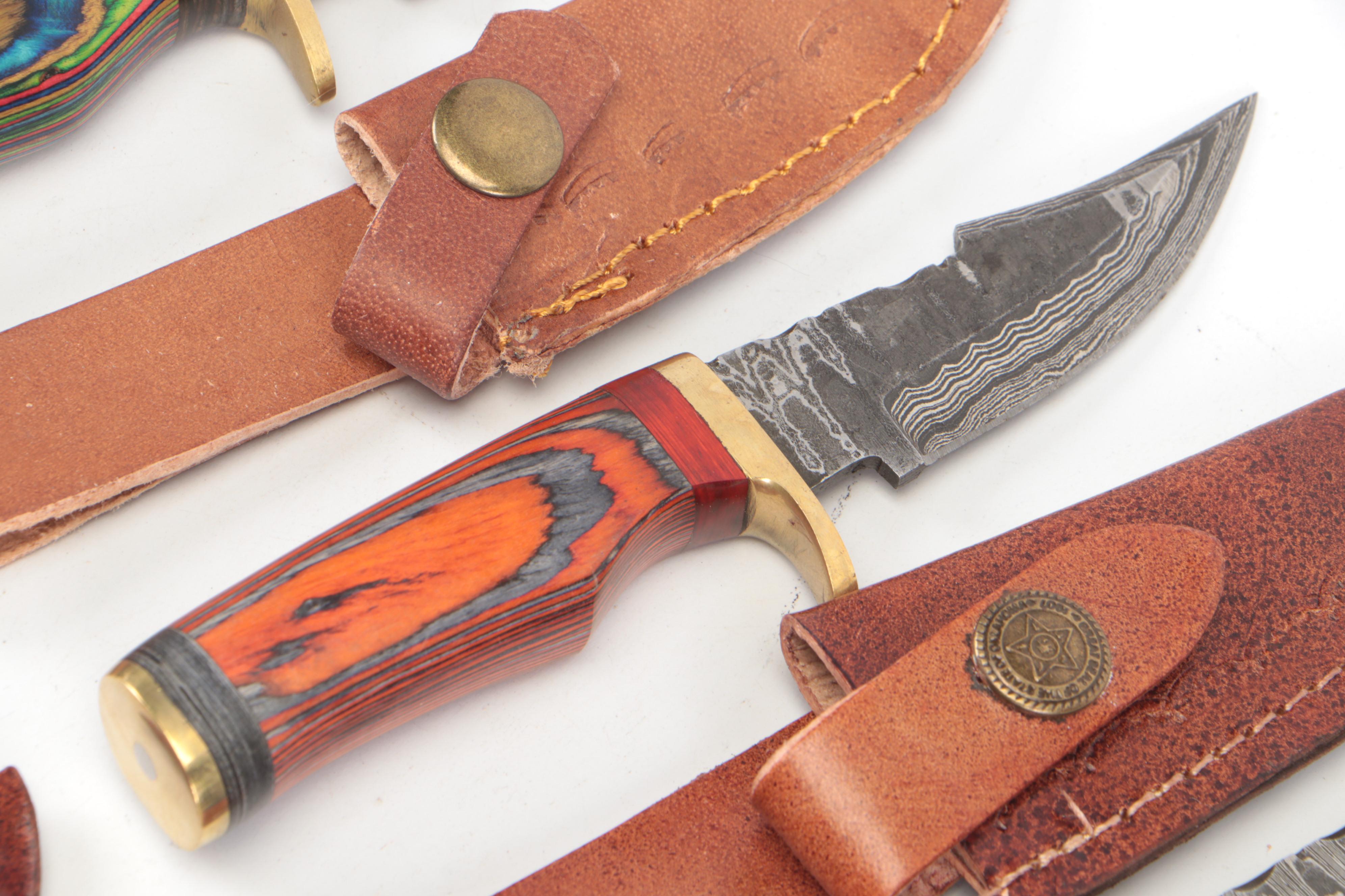 Damascus Steel Hunting Knives in Leather Sheaths