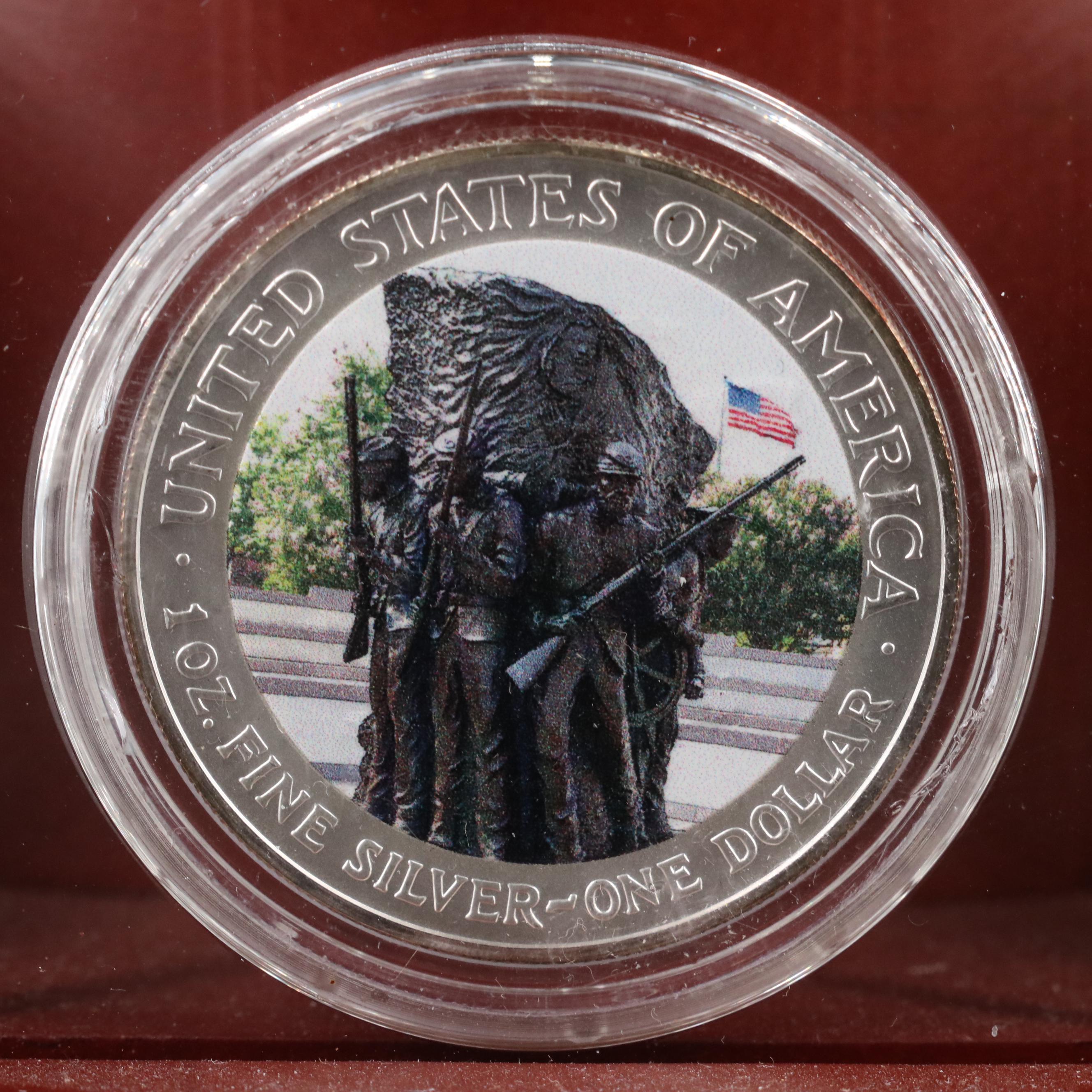 Resin Sculpture of a Bald Eagle With "War memorial" Colorized Silver Eagles